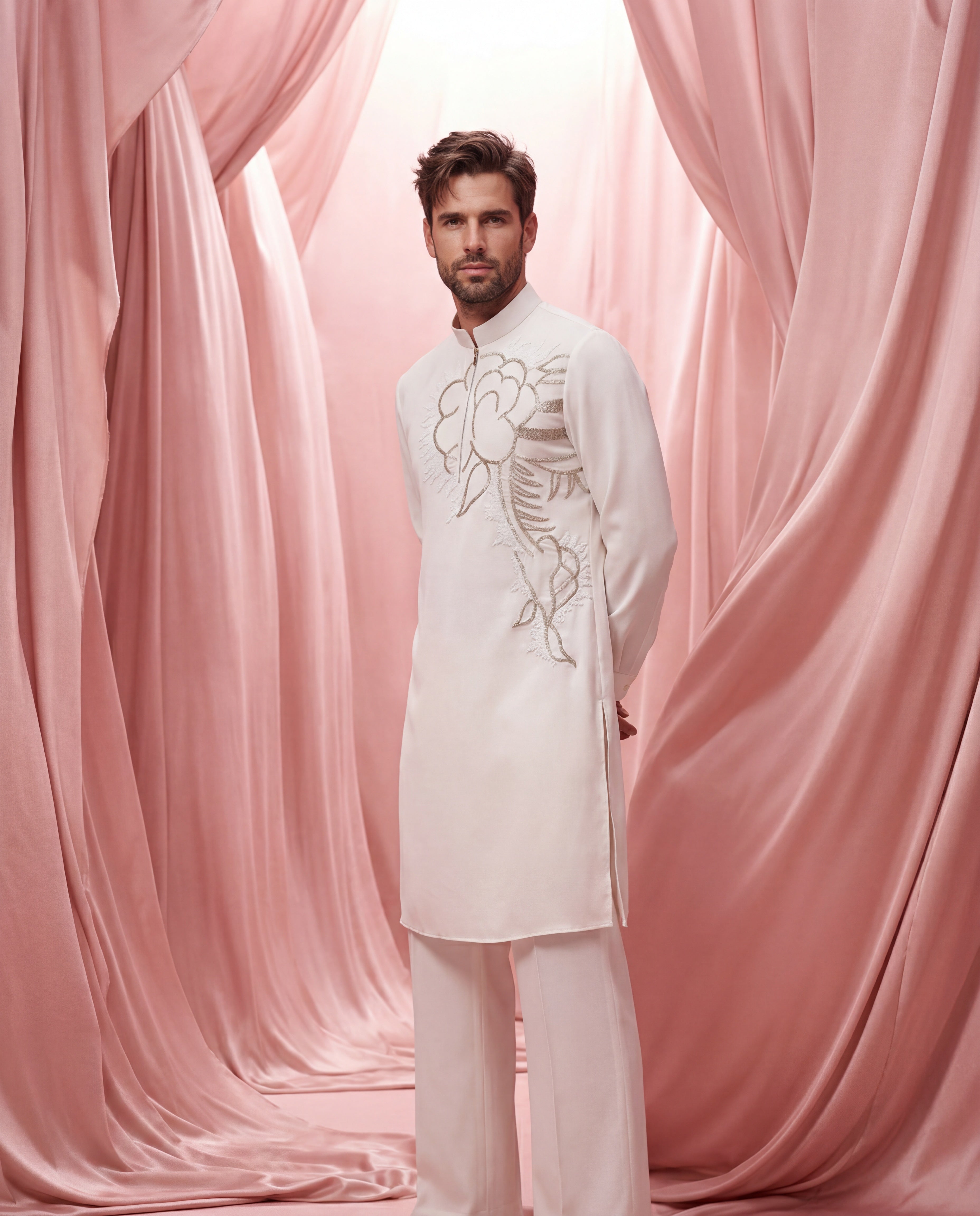 Cream knit kurta with floral embroidered detailing, paired with matching knit palazzo.