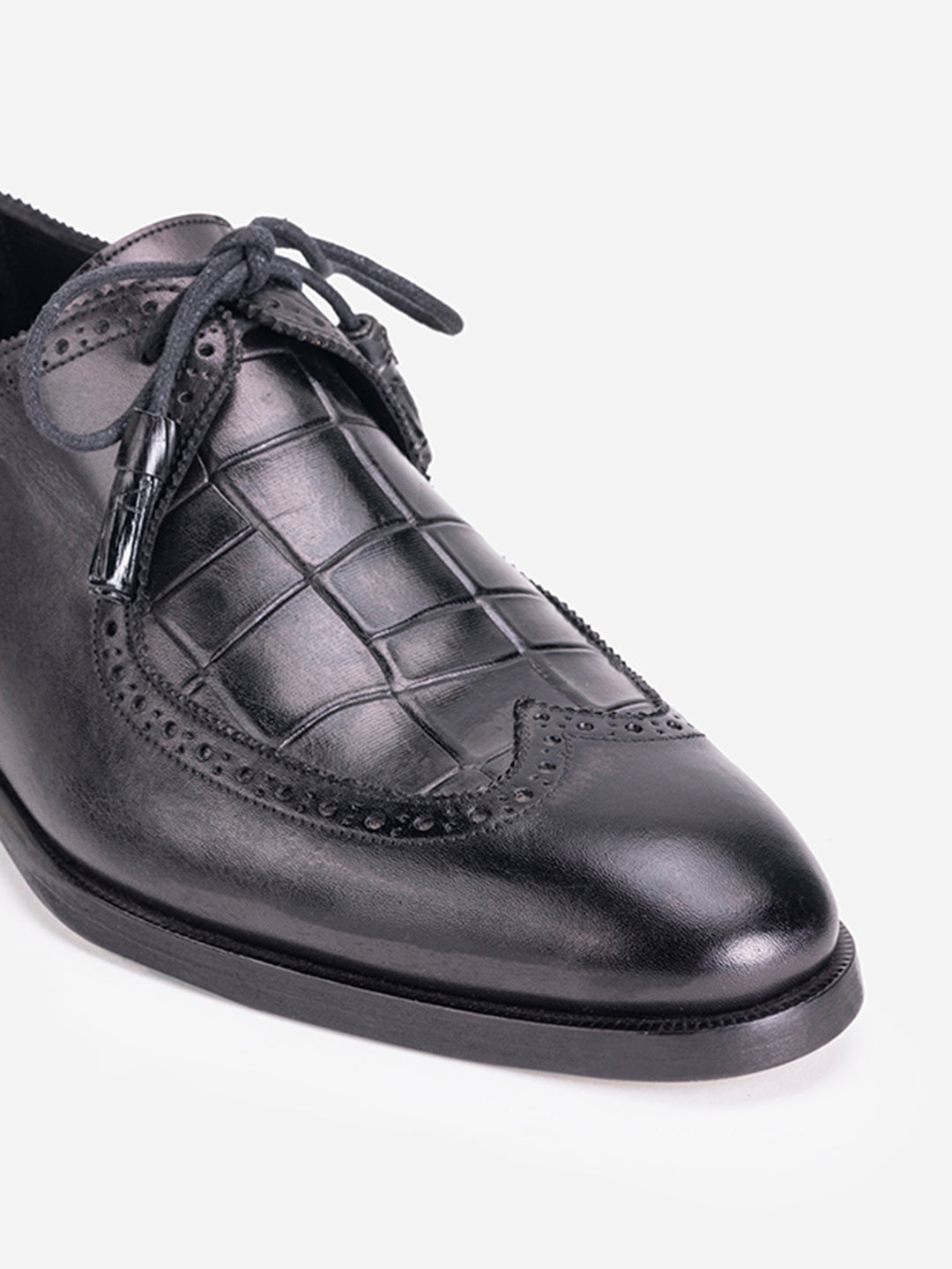 Black lace loafers with tassels