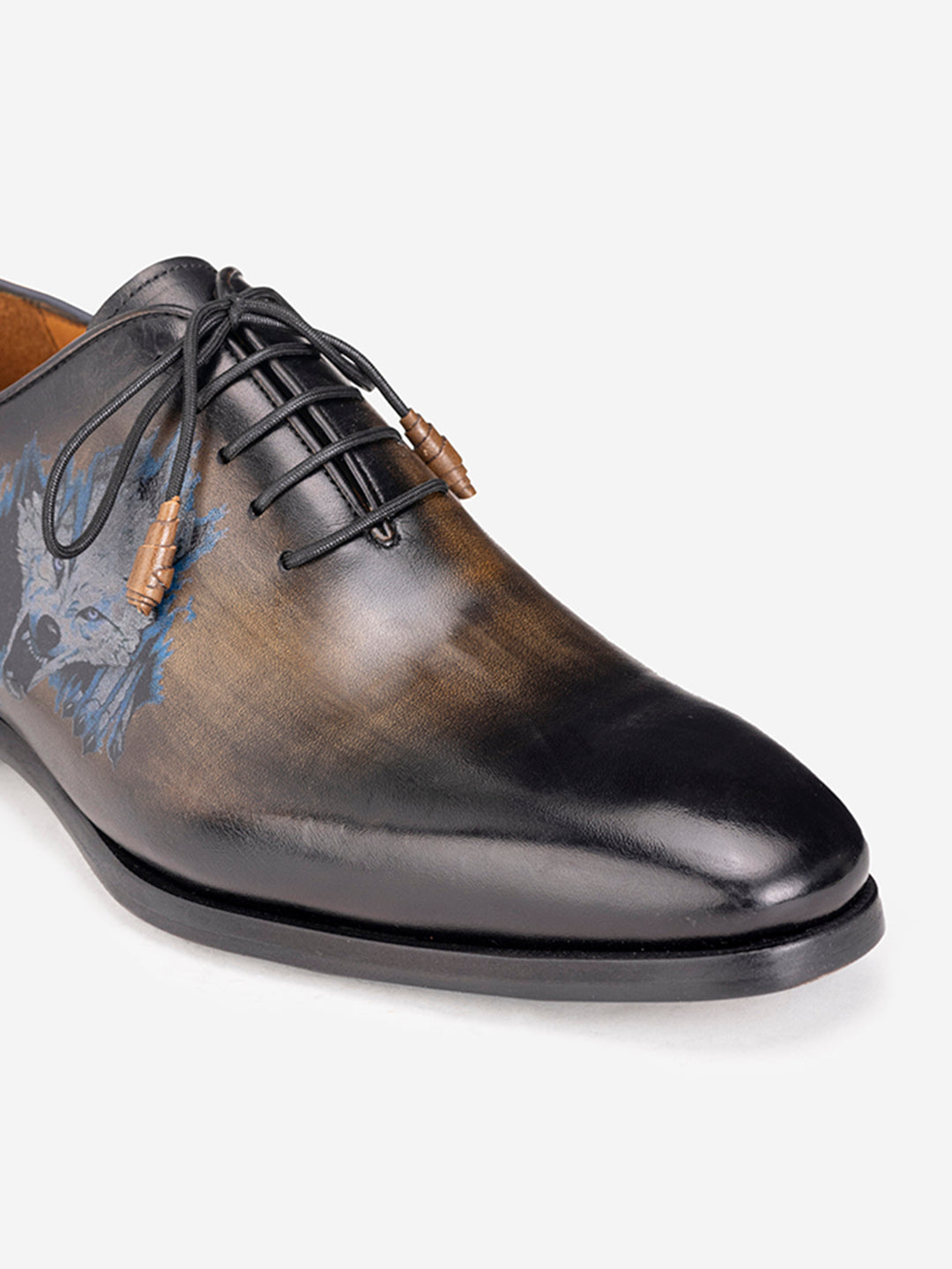 Tan lace loafers with Wolf motif