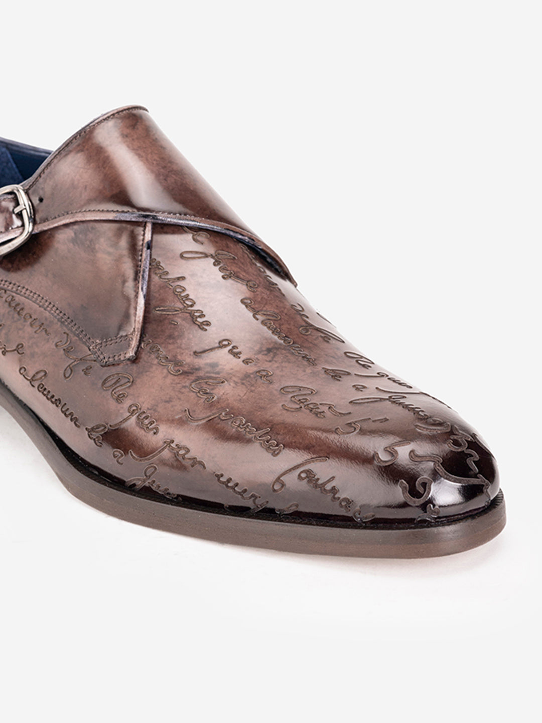 Brown engraved loafers with buckle