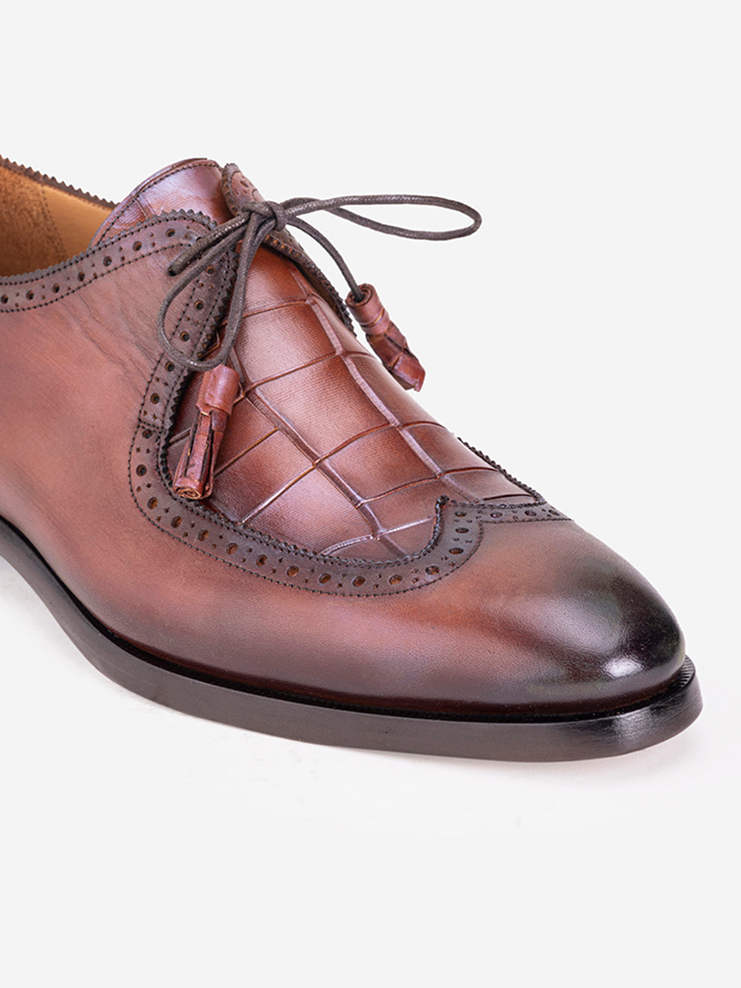 Tan lace loafers with tassels