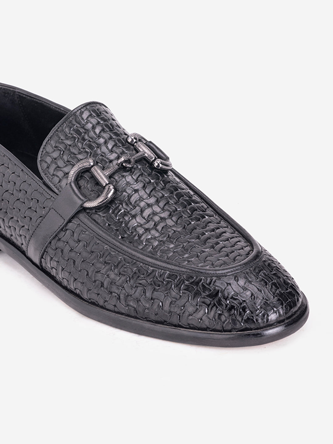 Patterned black loafers with buckle