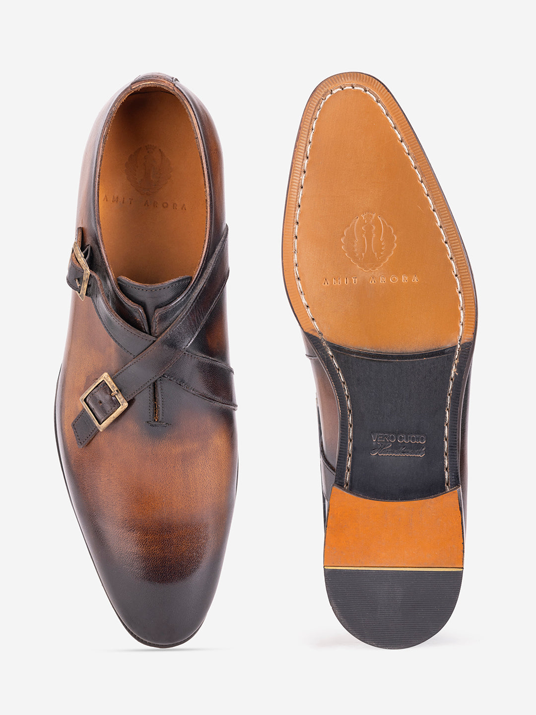 Strapped tan loafers with buckles