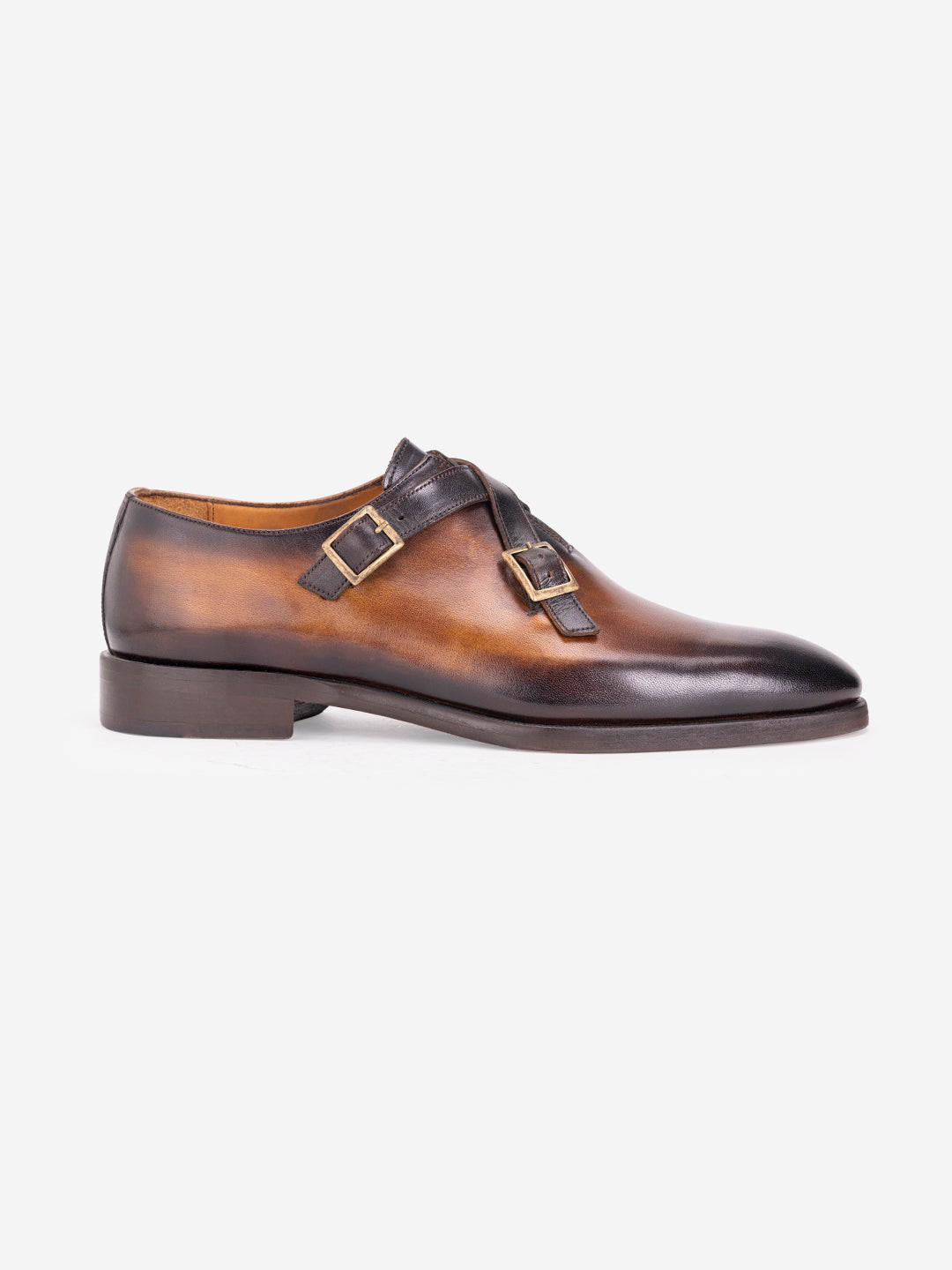 Strapped tan loafers with buckles