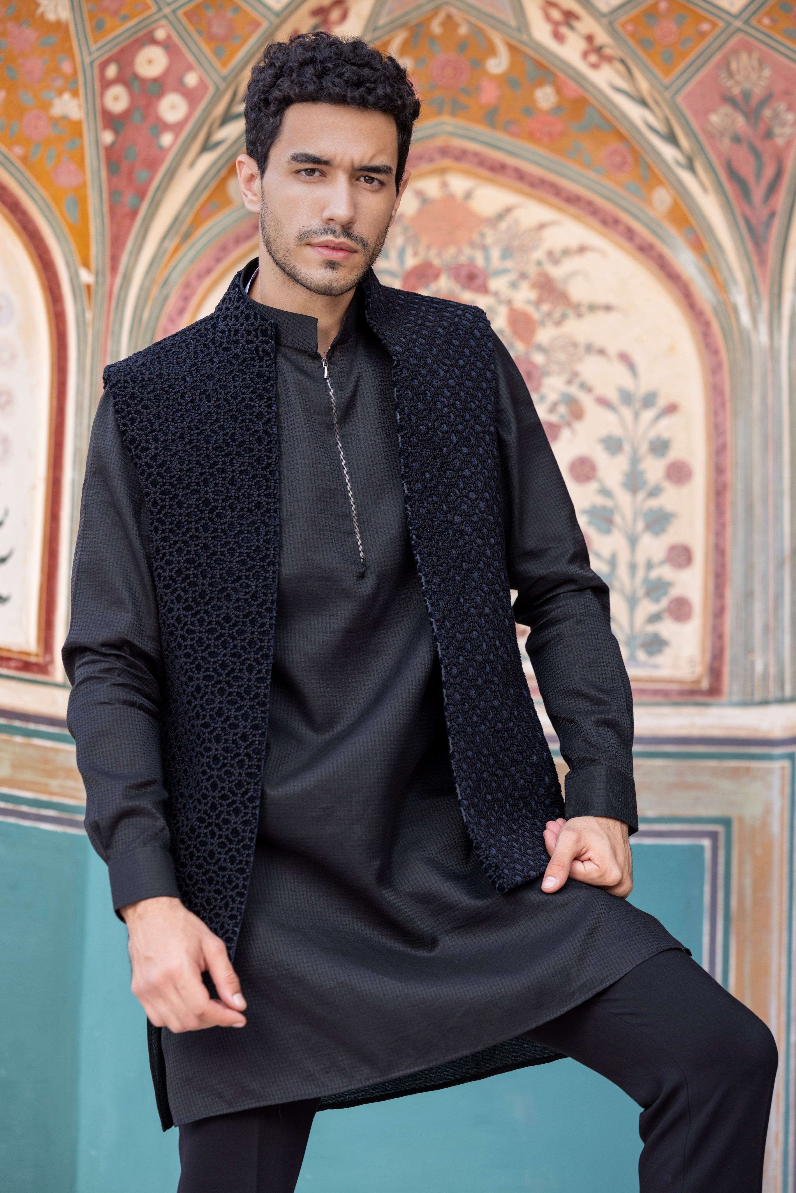 Hand embroidered Frech Knot waistcoat paired with kurta and aligadhi.