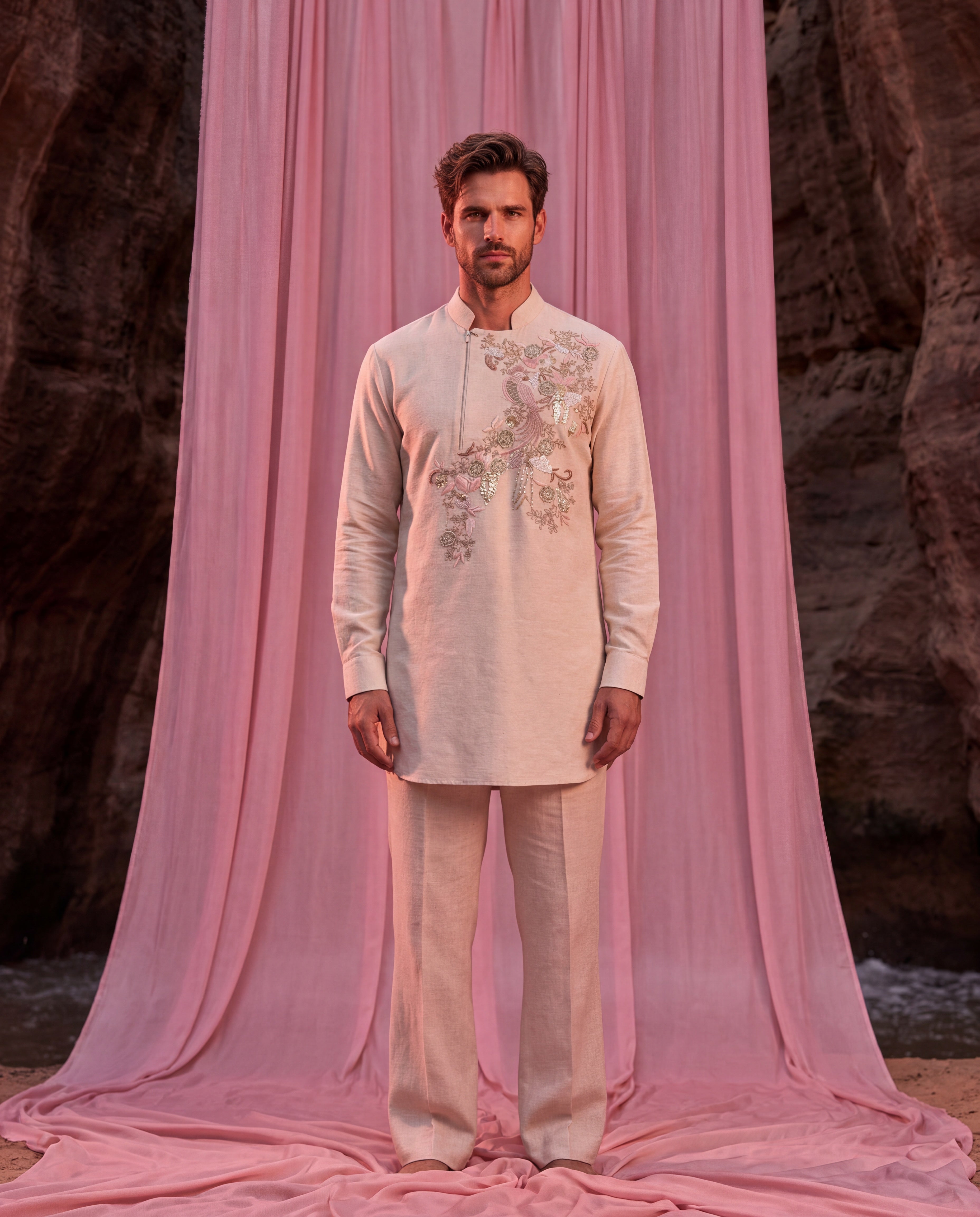 Beige Matka silk kurta with bird embroidery detailing, paired with matching Matka silk palazzo.