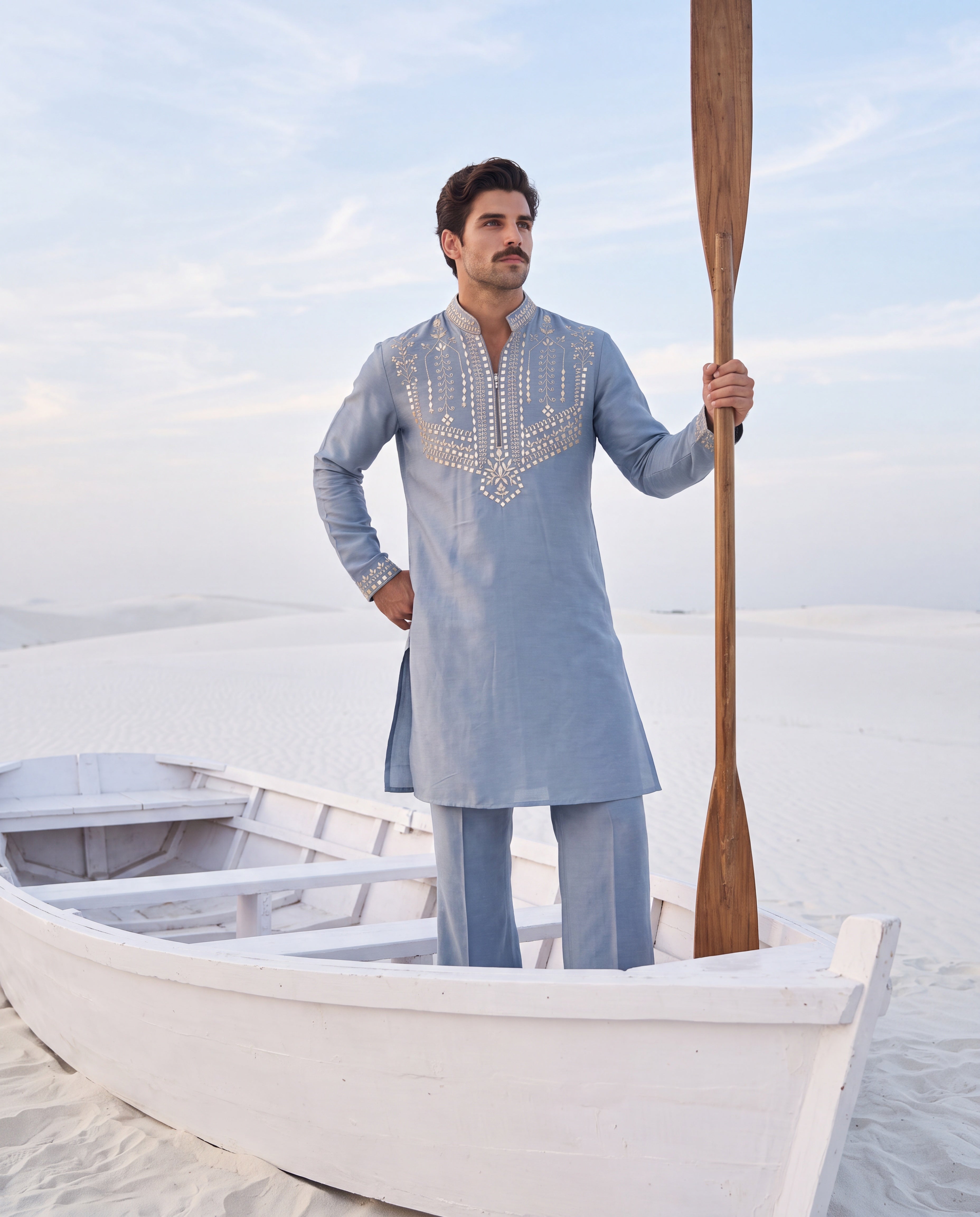 Medium blue Chanderi silk kurta with intricate embroidery, paired with matching Chanderi silk palazzo.