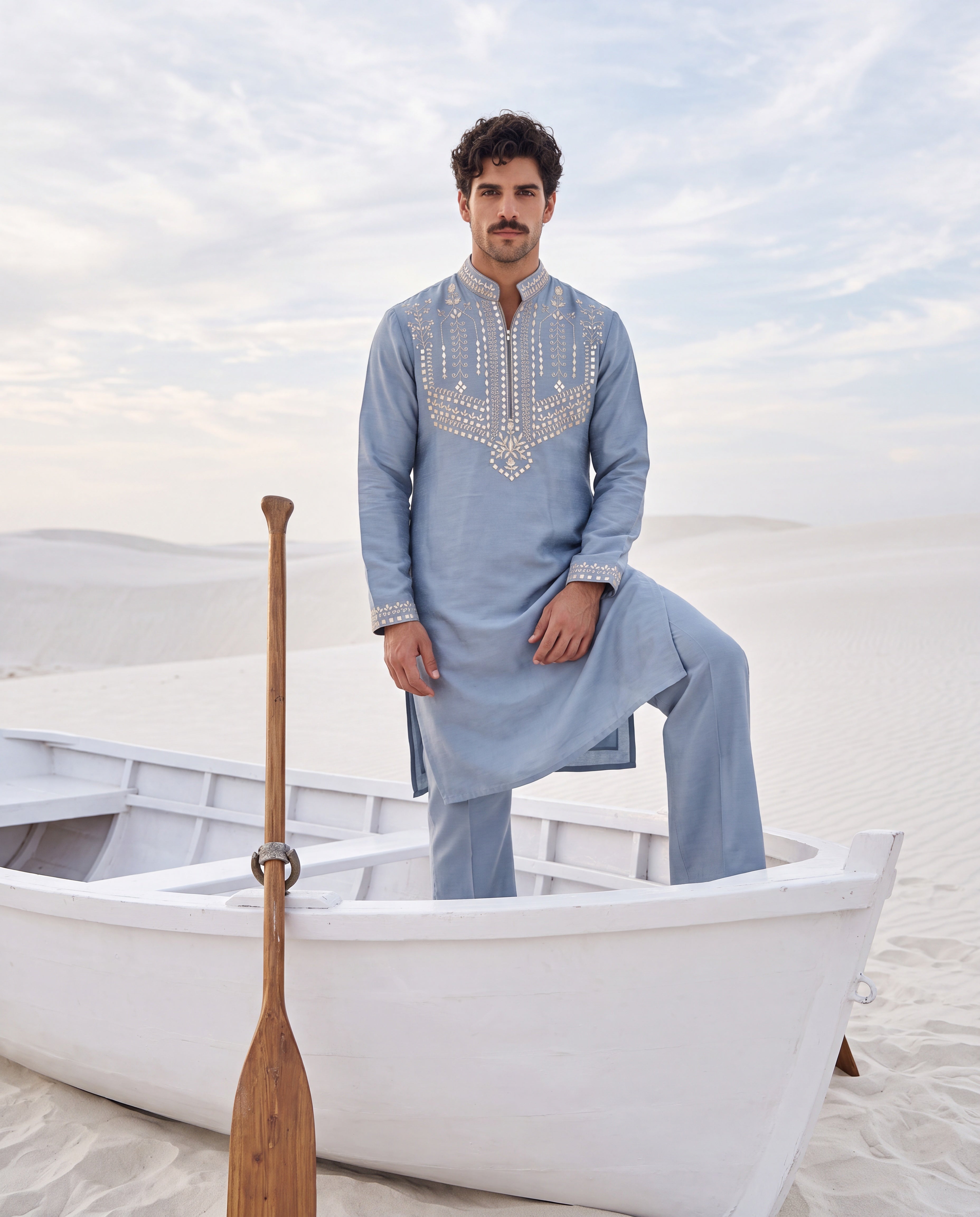 Medium blue Chanderi silk kurta with intricate embroidery, paired with matching Chanderi silk palazzo.