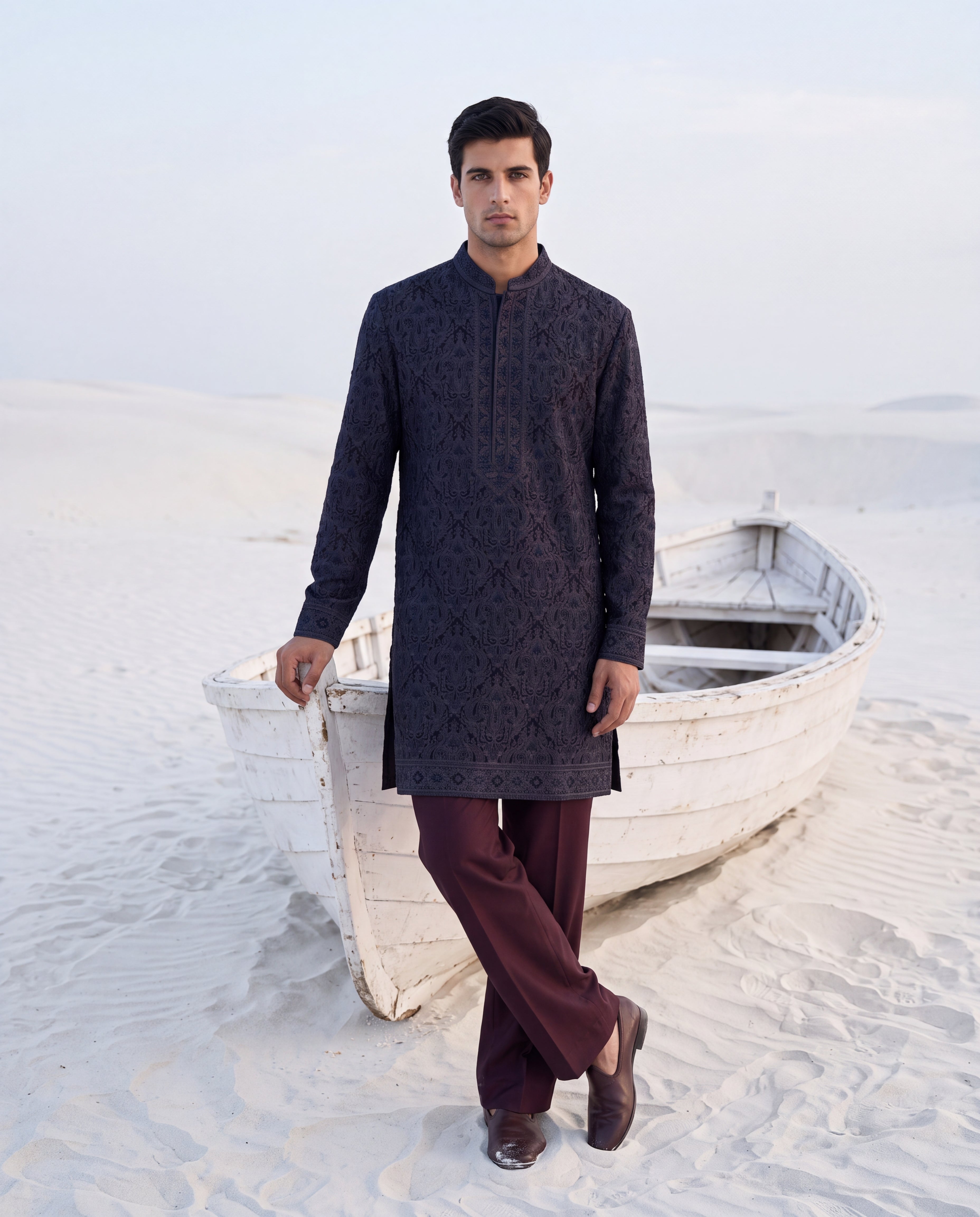 Multi-colour silk kurta with contrast embroidery detailing, paired with a cotton modal palazzo.