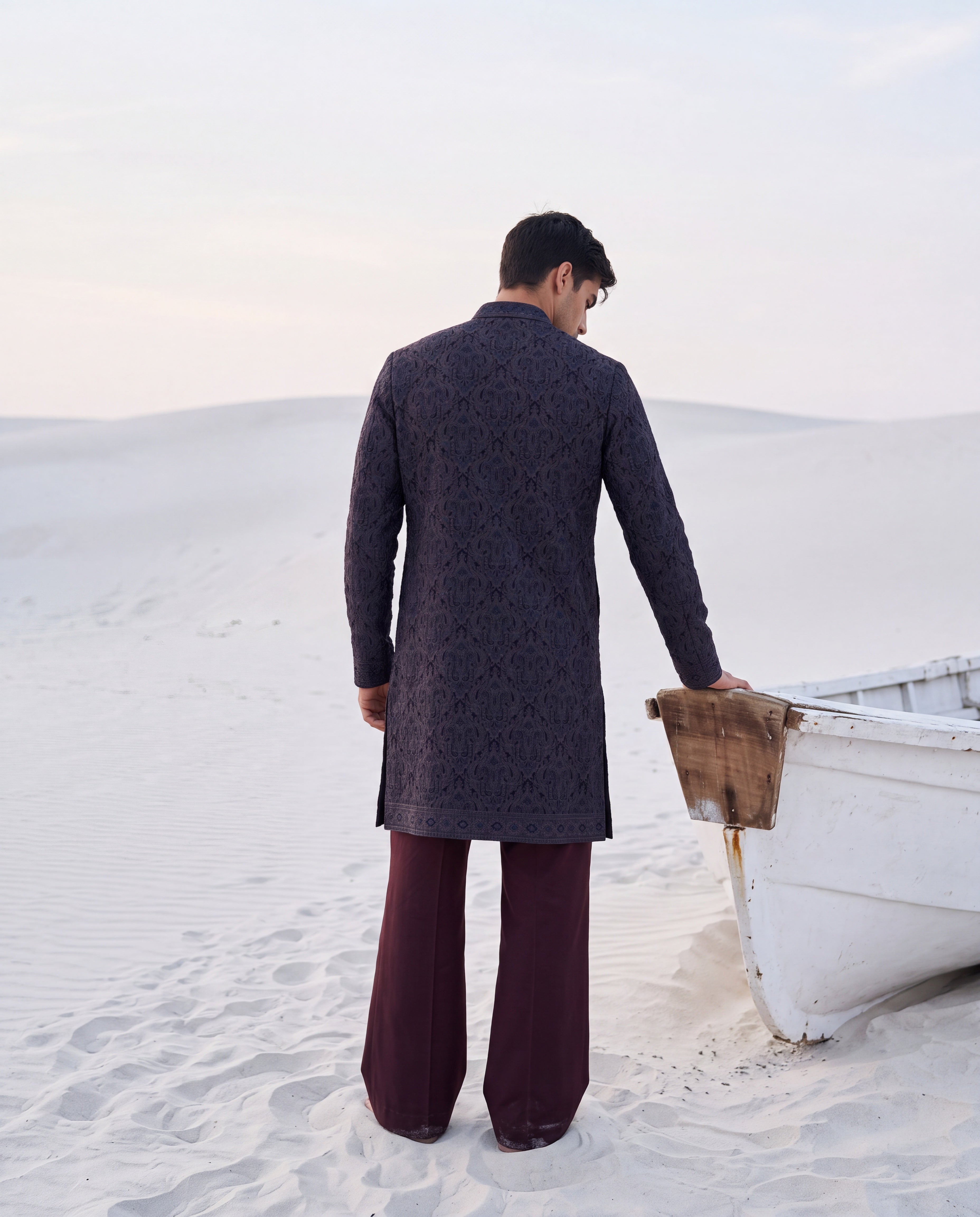 Multi-colour silk kurta with contrast embroidery detailing, paired with a cotton modal palazzo.