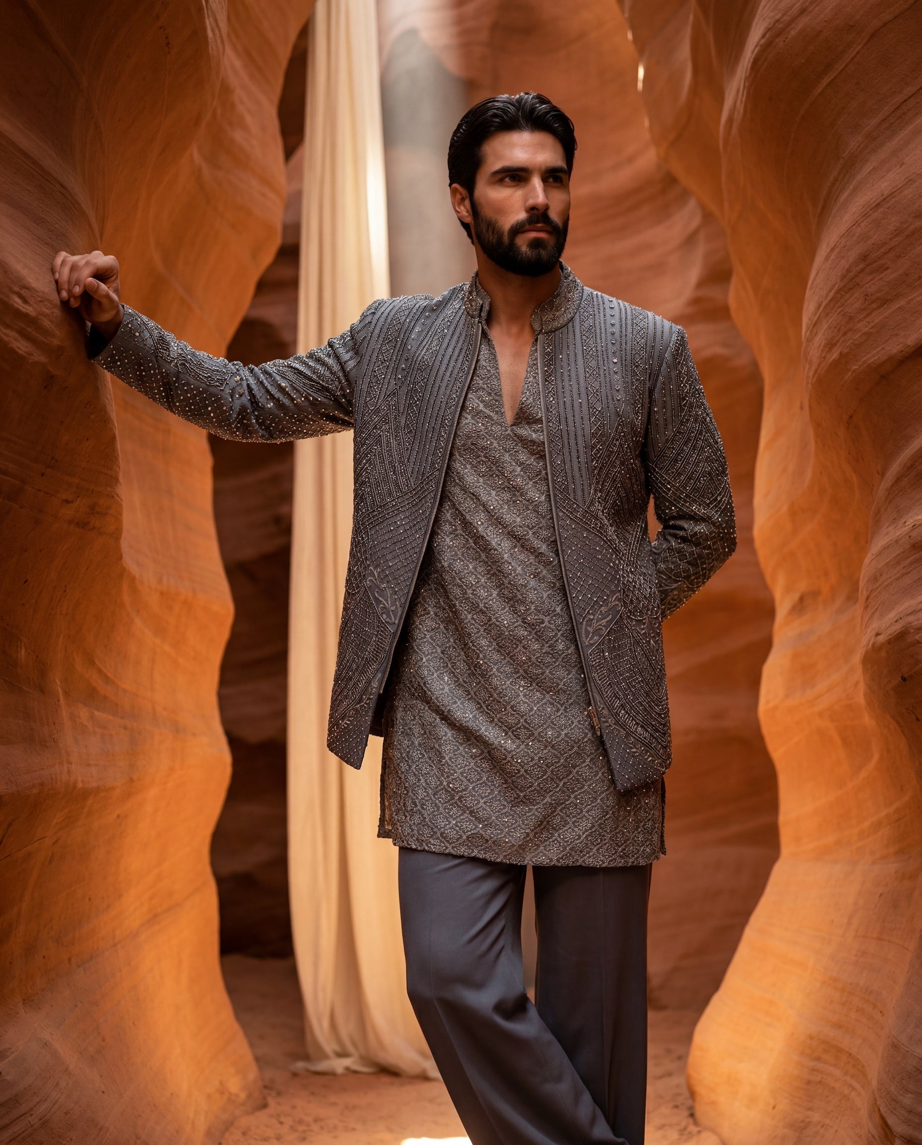 Olive green Linen rayon Indo-Western jacket with metallic embroidery detailing, paired with an embroidered georgette kurta and matching pants.