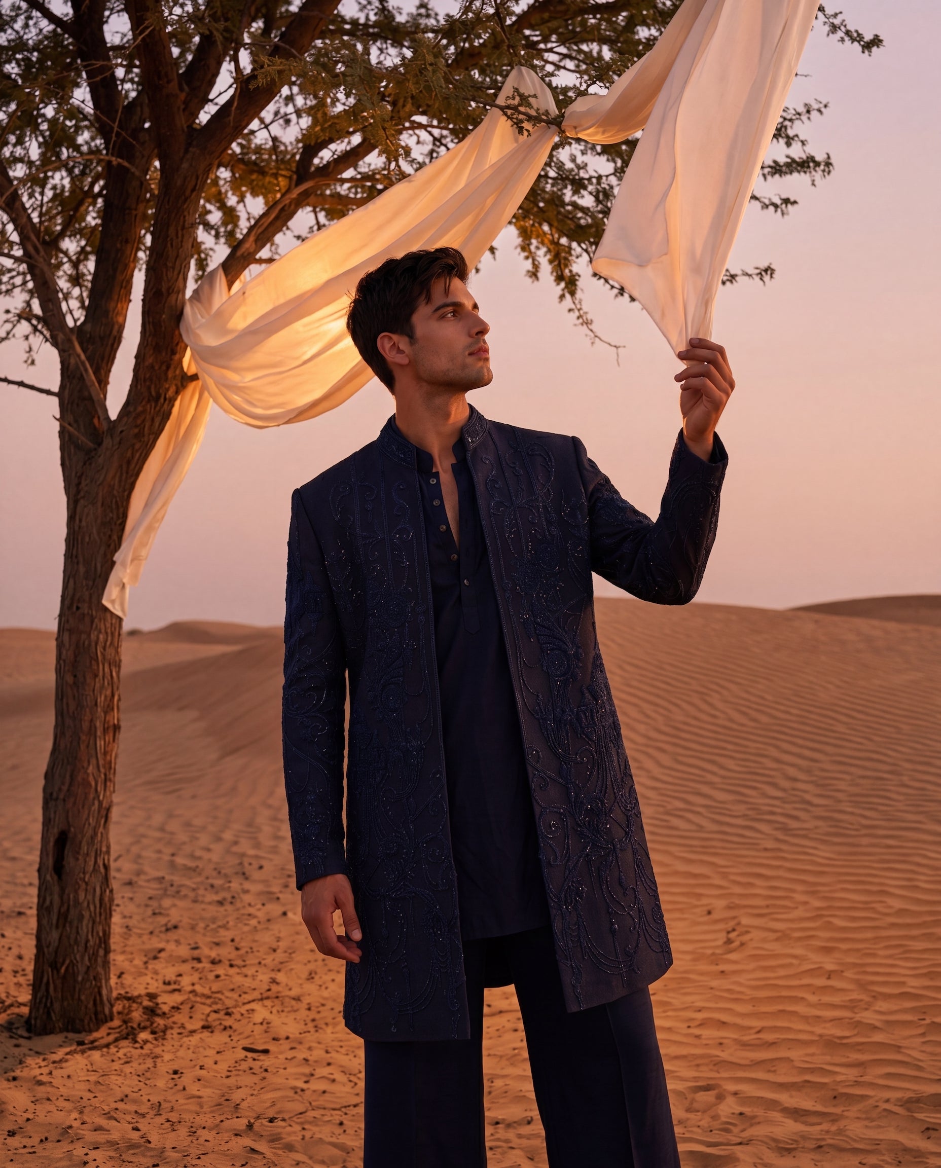 Black Textured knit Indo-Western jacket with tonal embroidery, paired with a crepe kurta and matching palazzo.