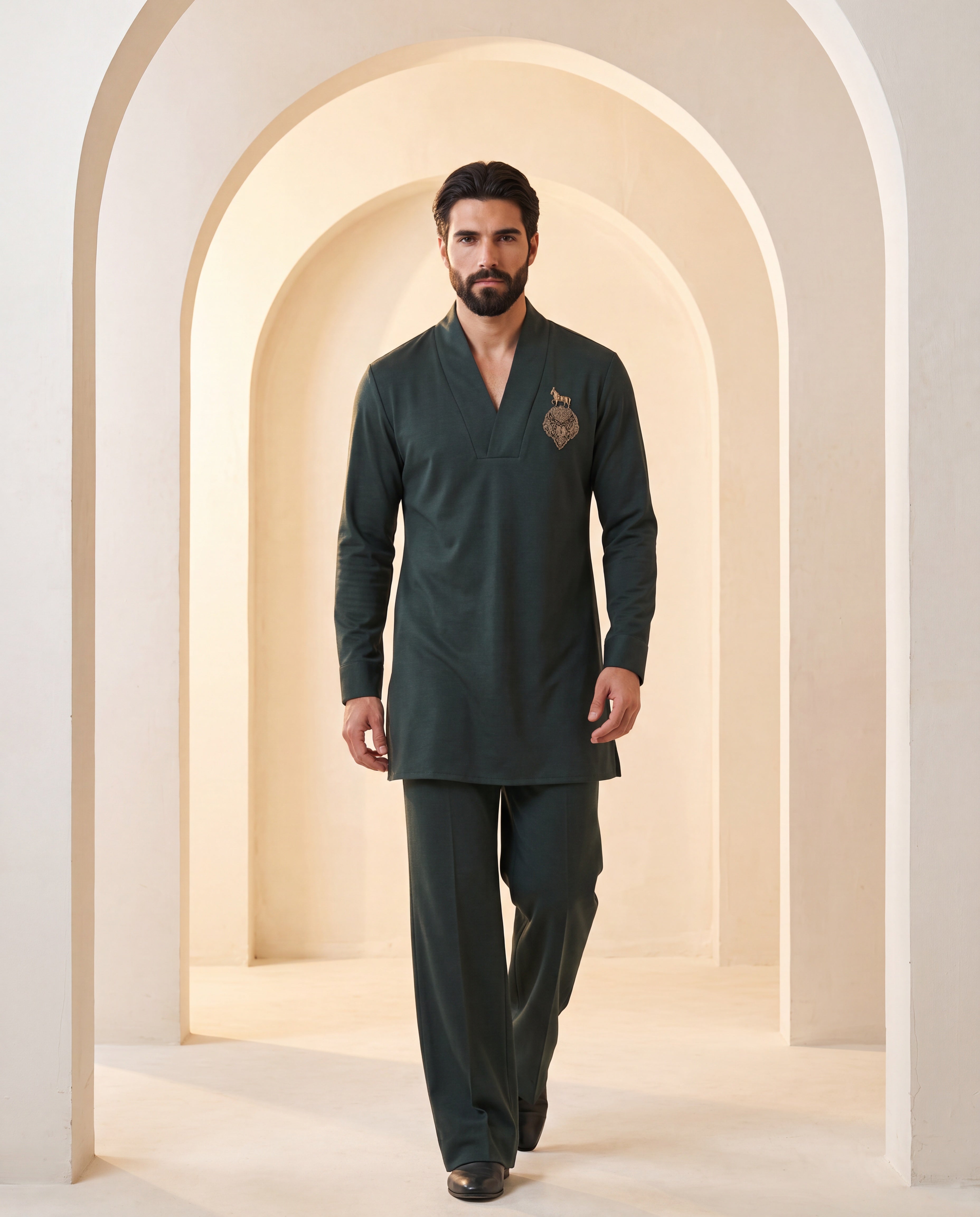Dark olive green knit kurta with gold brooch with embroidery detailing, paired with matching knit palazzo.