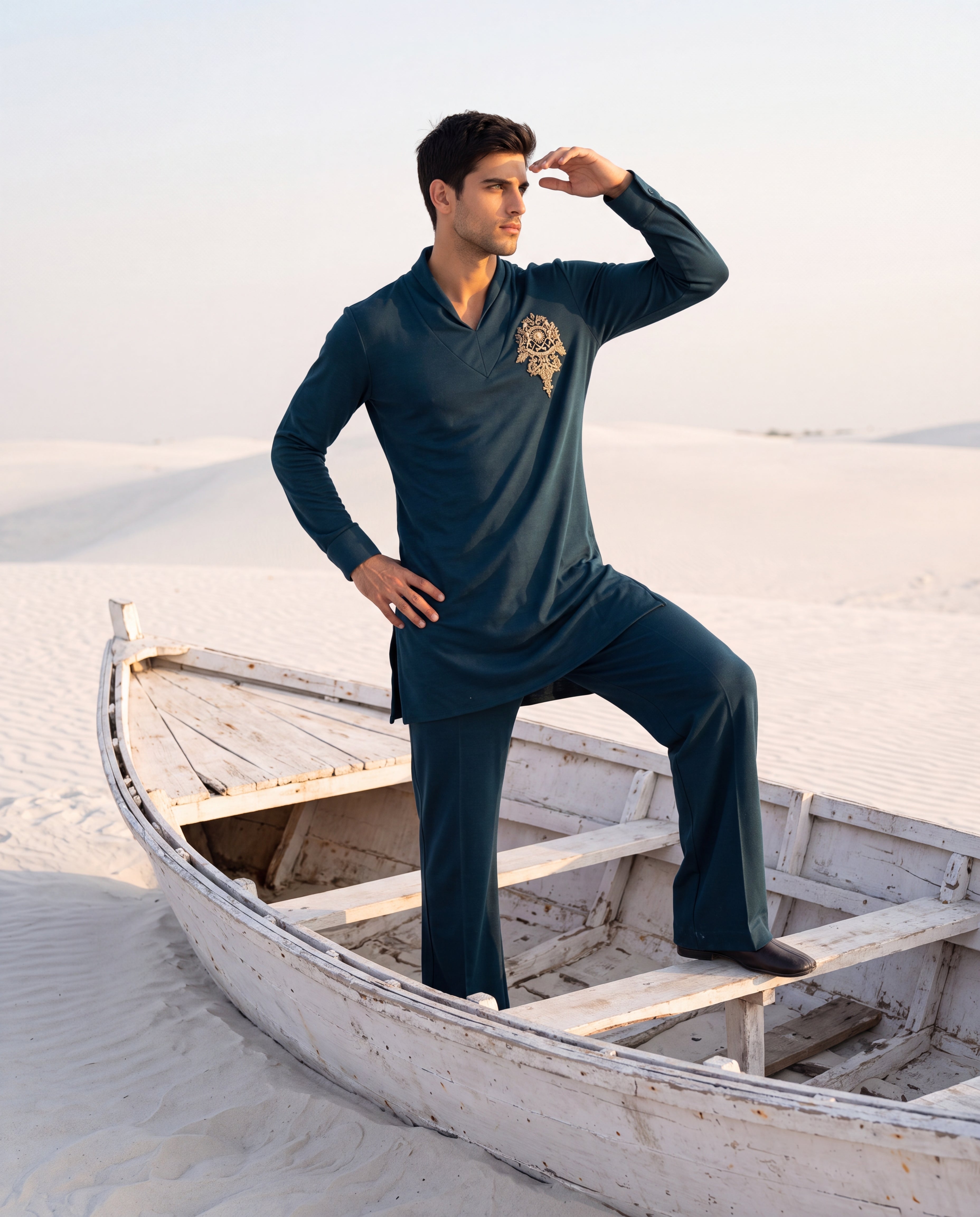 Turquoise knit kurta with gold embroidery detailing, paired with matching knit palazzo.