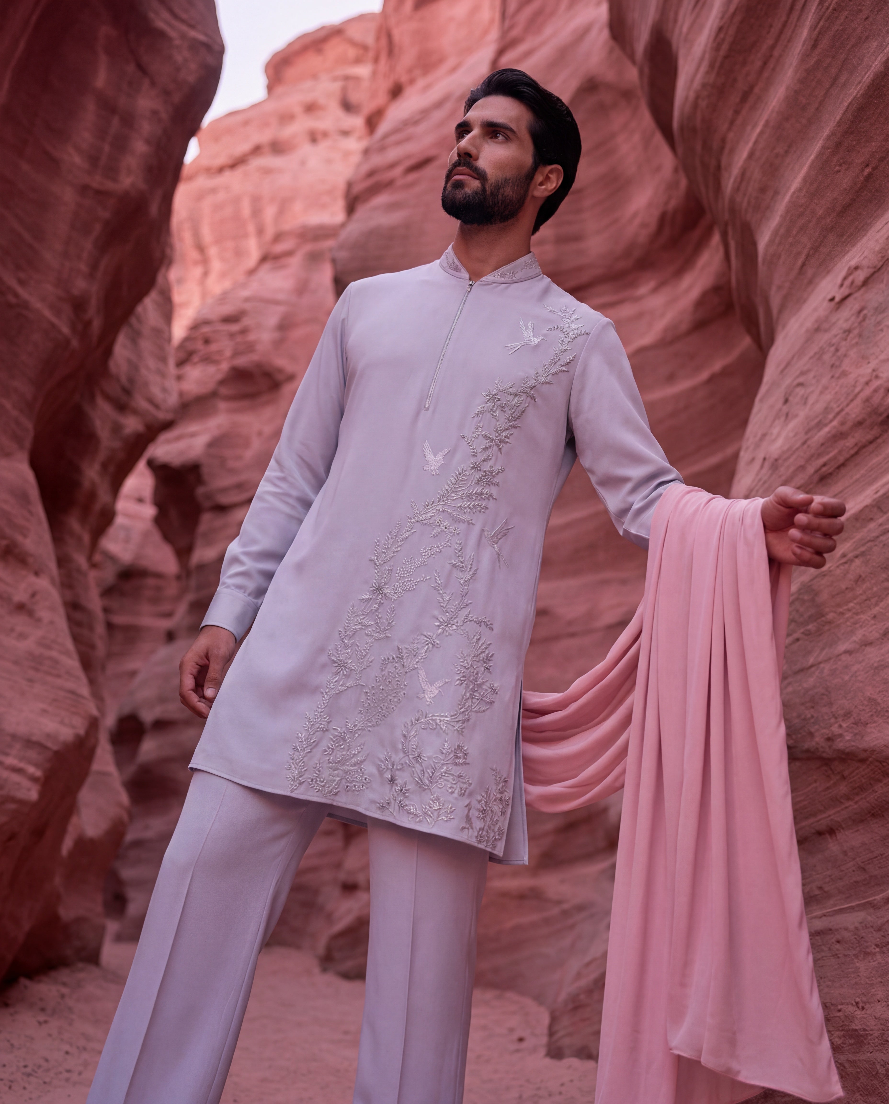 Lilac knit kurta with monntone embroidery detailing, paired with matching knit palazzo.