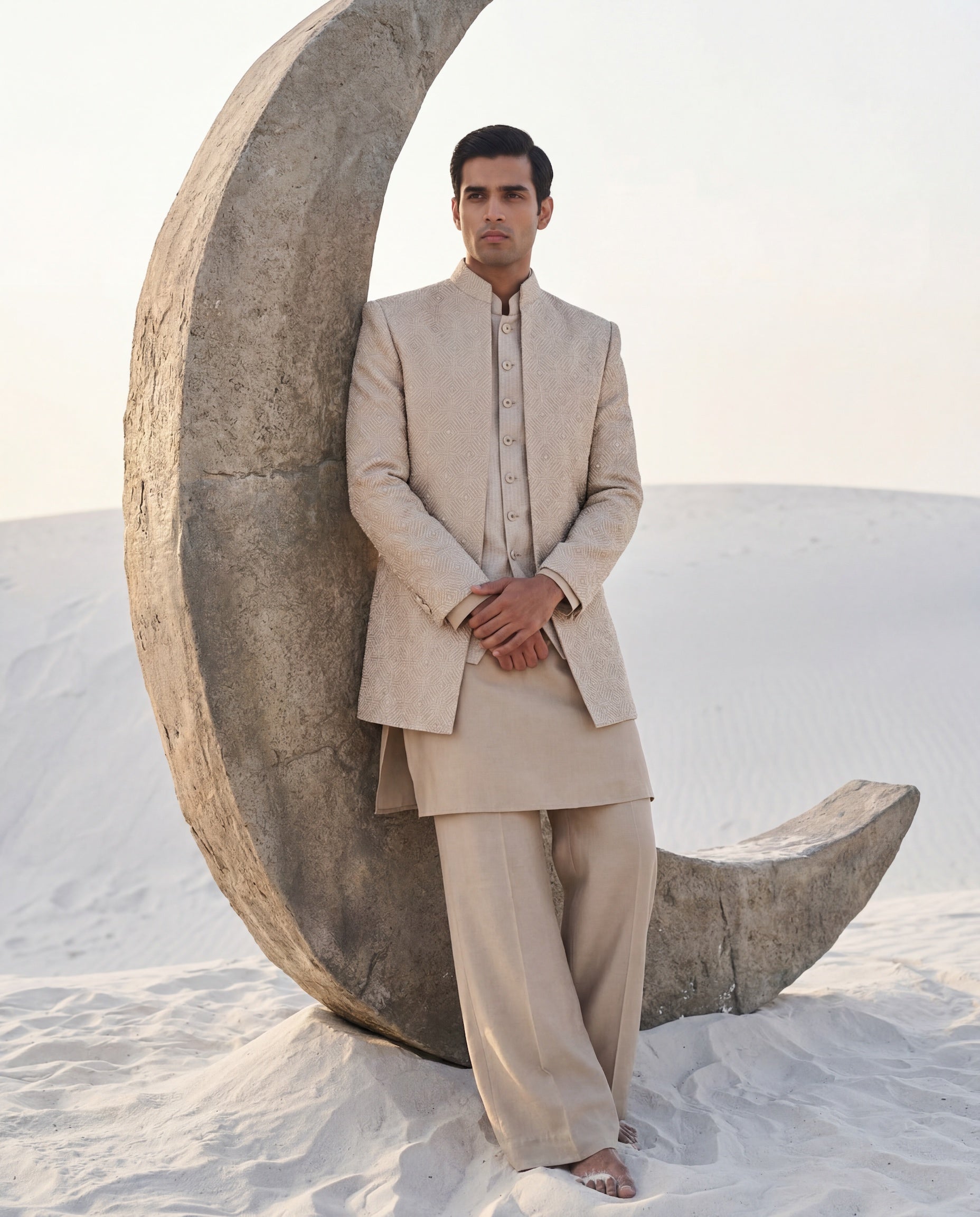 Banarasi silk Indo-Western jacket with tonal geometric detailing, paired with a matching banarasi silk waistcoat, silk kurta and palazzo.