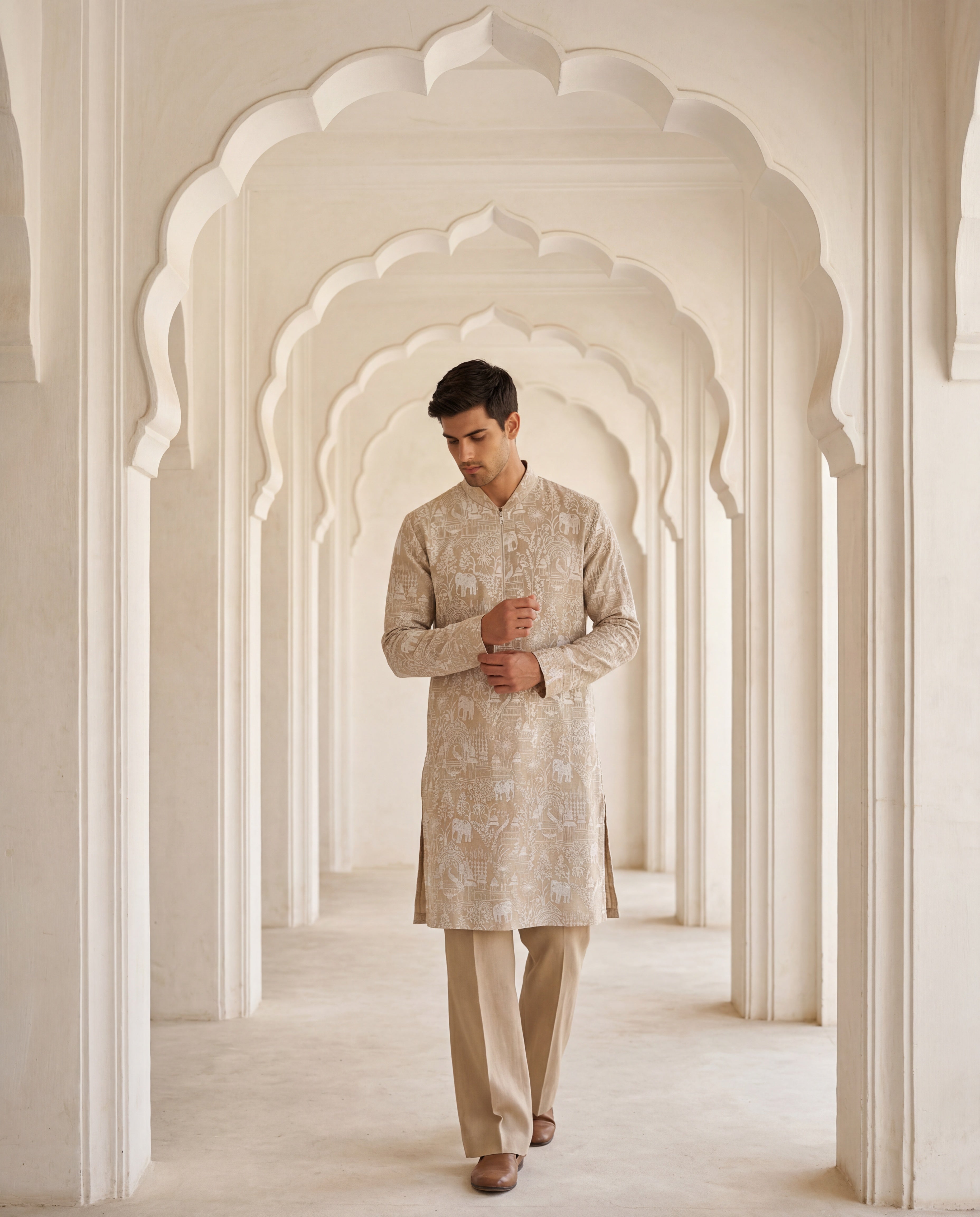 Beige Chanderi silk kurta with intricate embroidery all over, paired with matching Chanderi silk aligadhi.