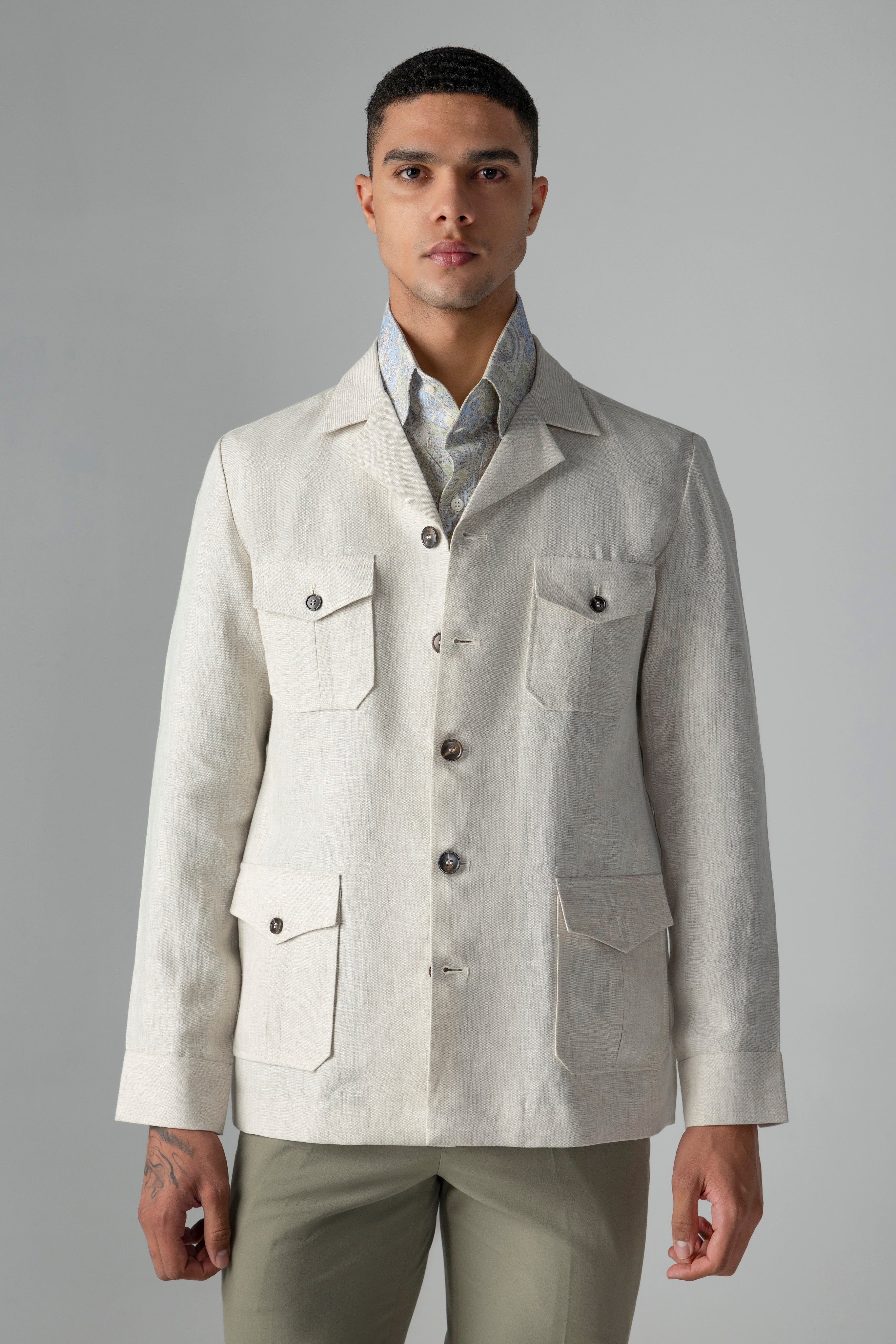 Beige linen shacket with four patch pockets, Cuban collar and contrast button detailing