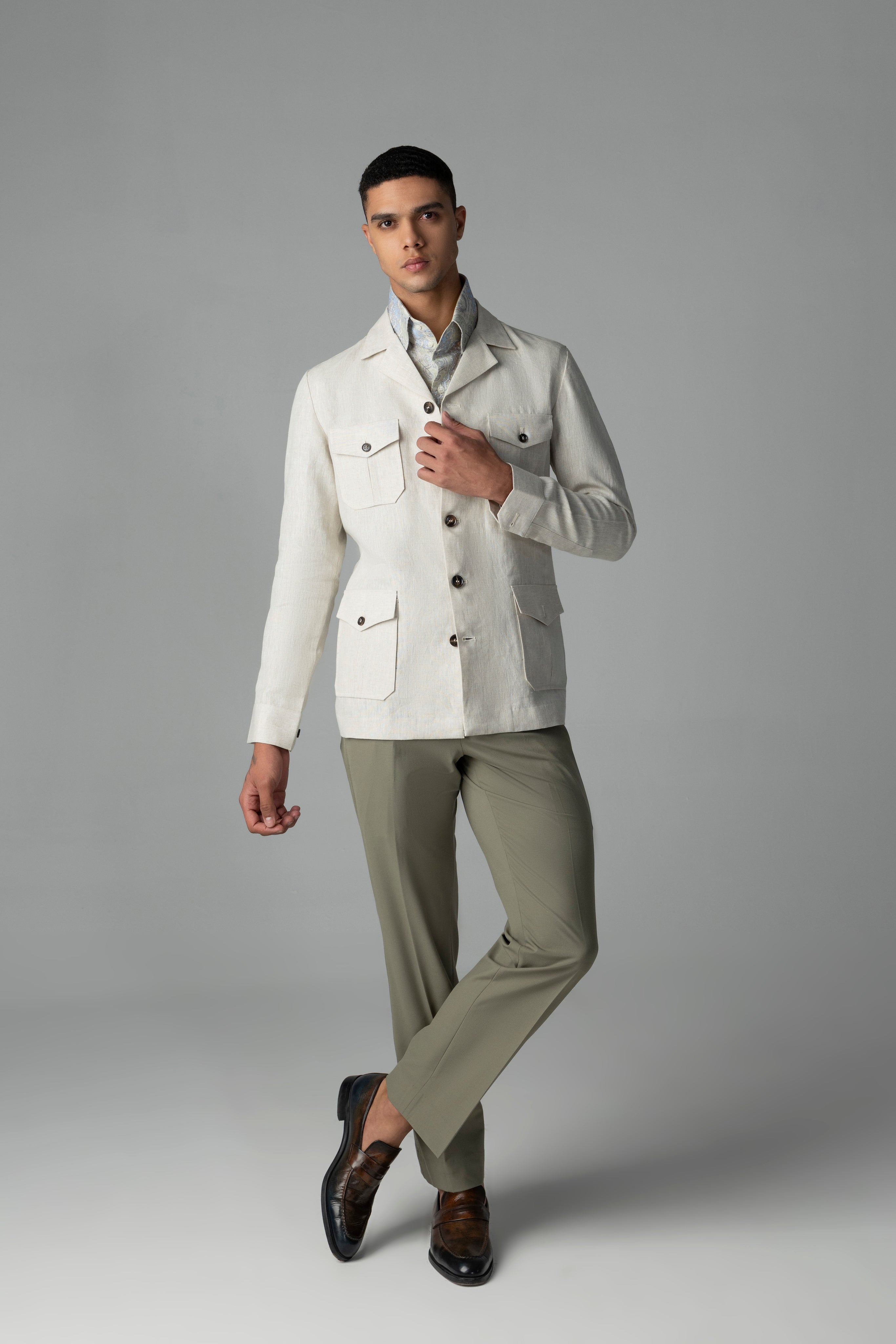 Beige linen shacket with four patch pockets, Cuban collar and contrast button detailing