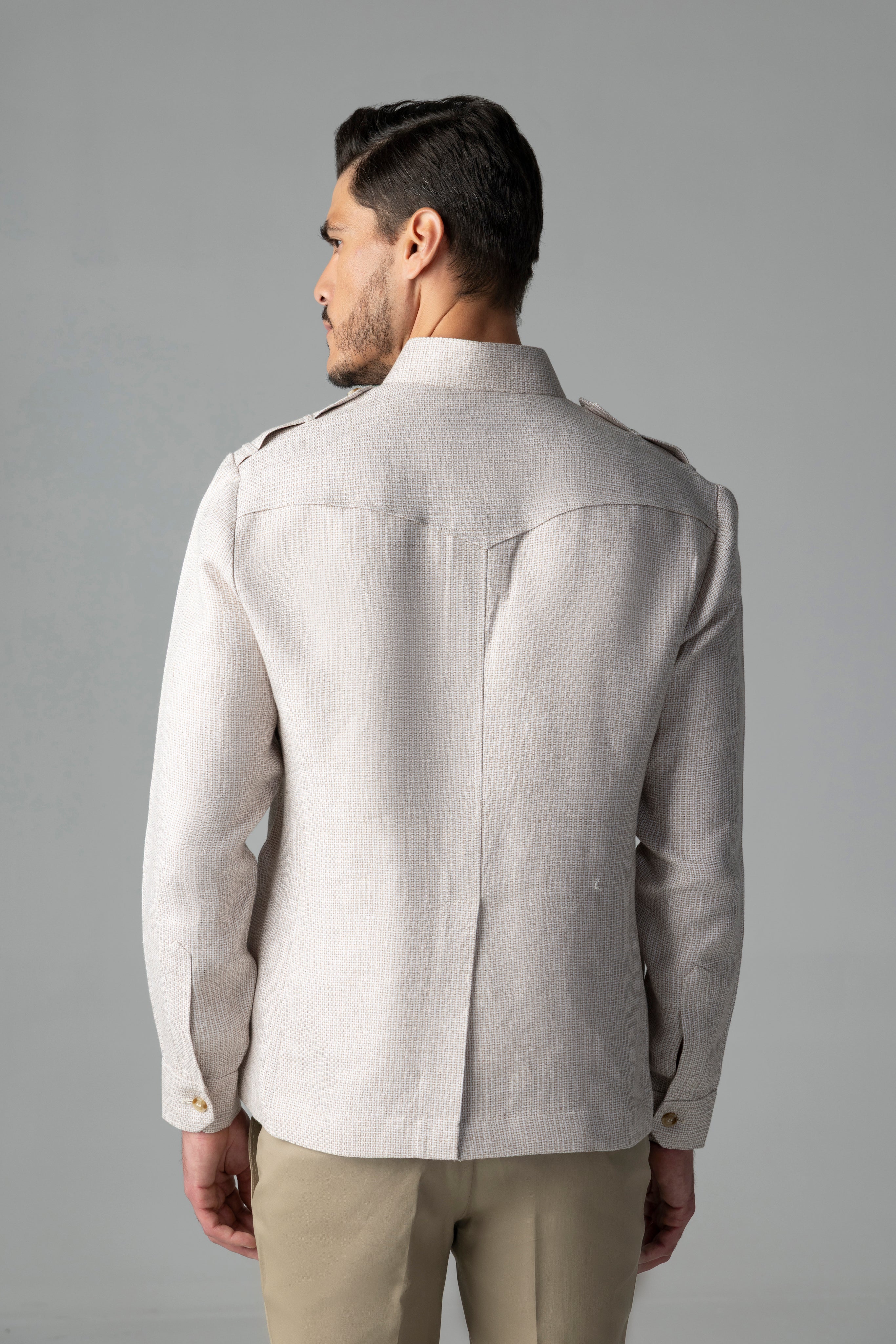 Textured beige linen shacket with two patch pockets, two bone pockets, Mandarin collar & contrast button detailing