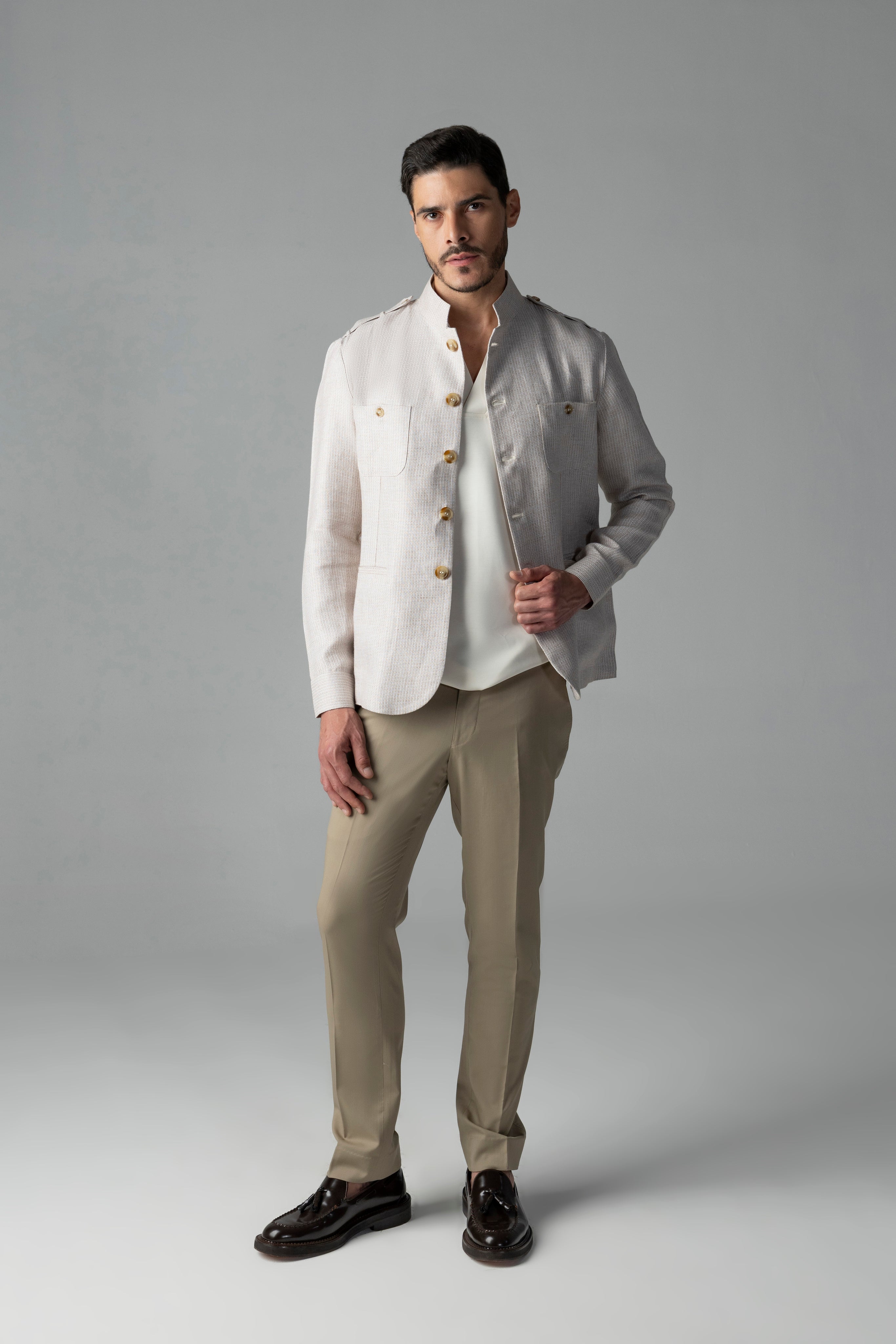 Textured beige linen shacket with two patch pockets, two bone pockets, Mandarin collar & contrast button detailing