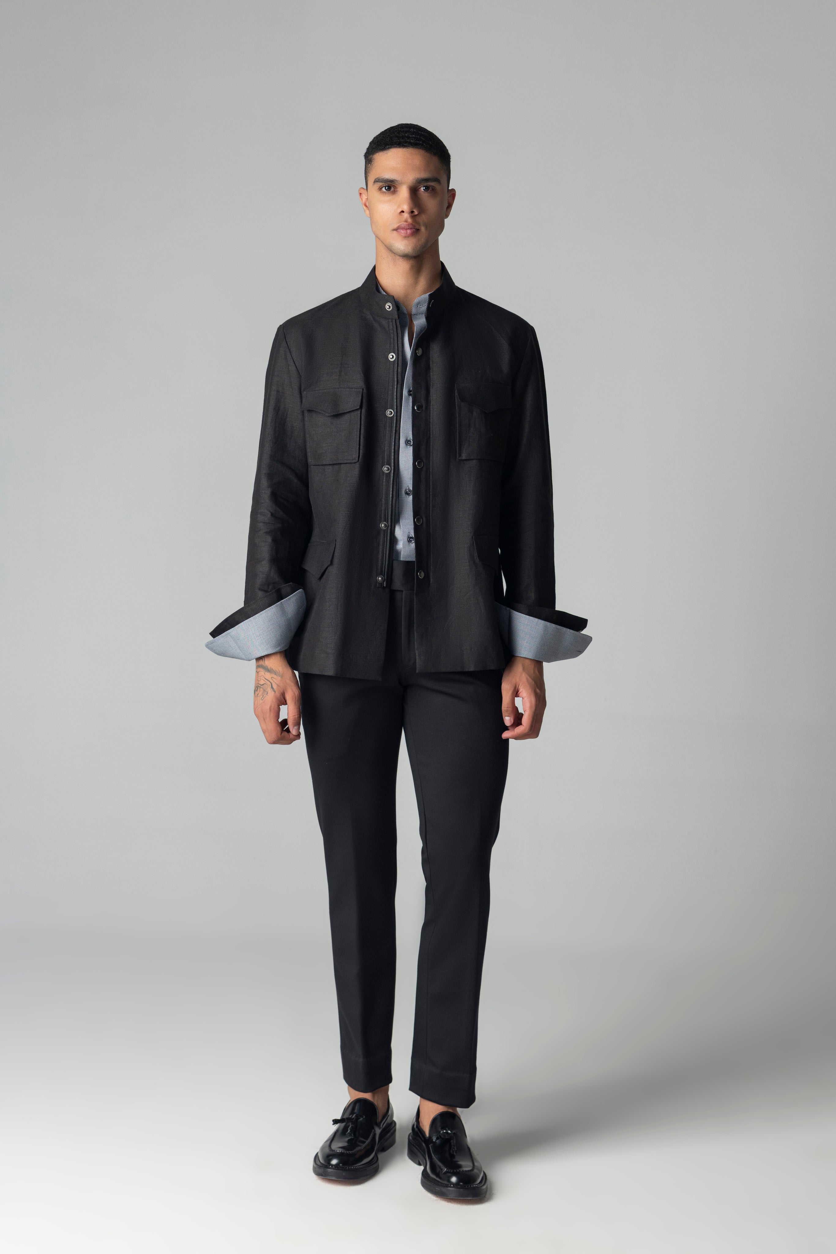 Black linen shacket with four patch pockets, Mandarin collar with zipper & snap button detailing.
