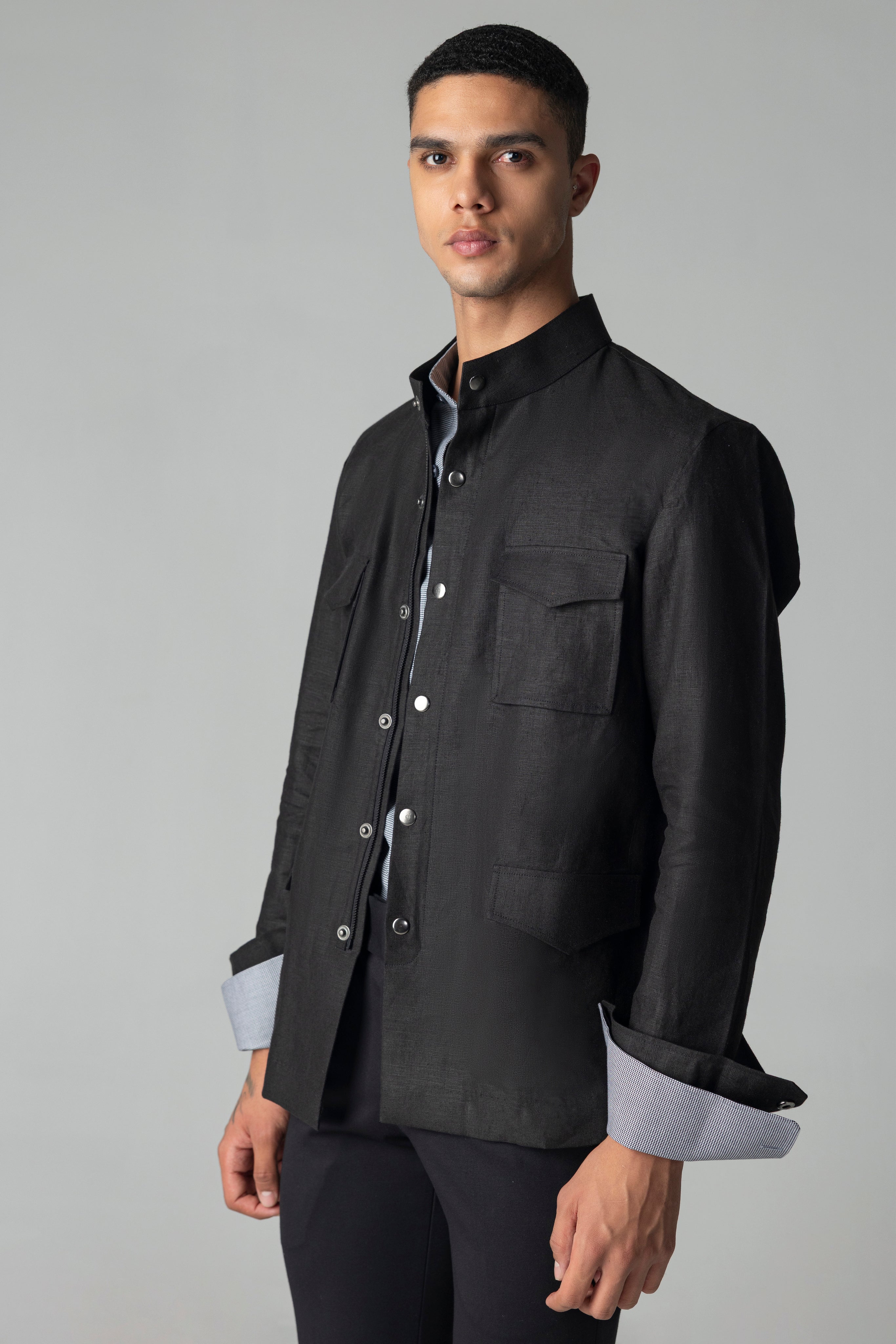 Black linen shacket with four patch pockets, Mandarin collar with zipper & snap button detailing.