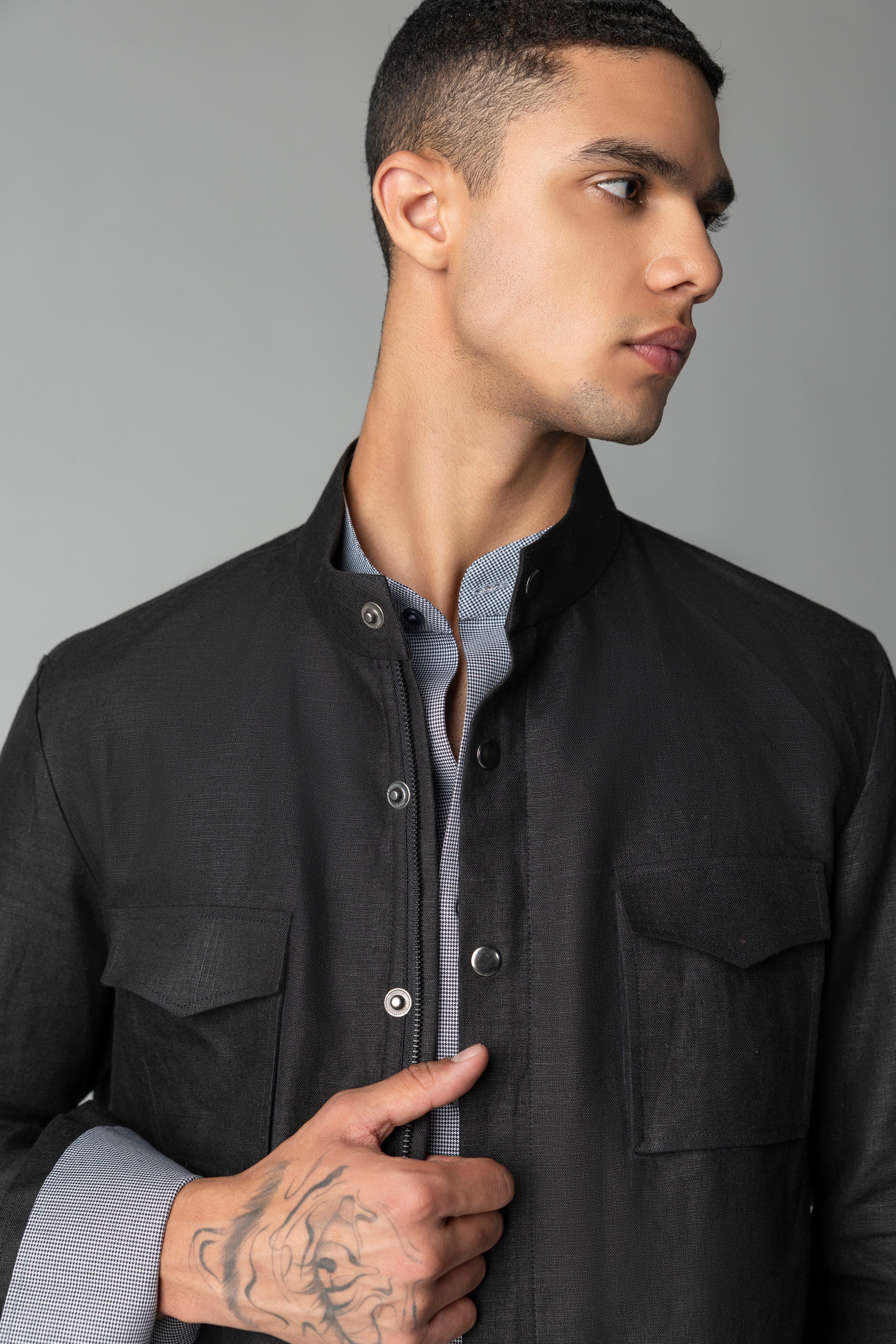 Black linen shacket with four patch pockets, Mandarin collar with zipper & snap button detailing.
