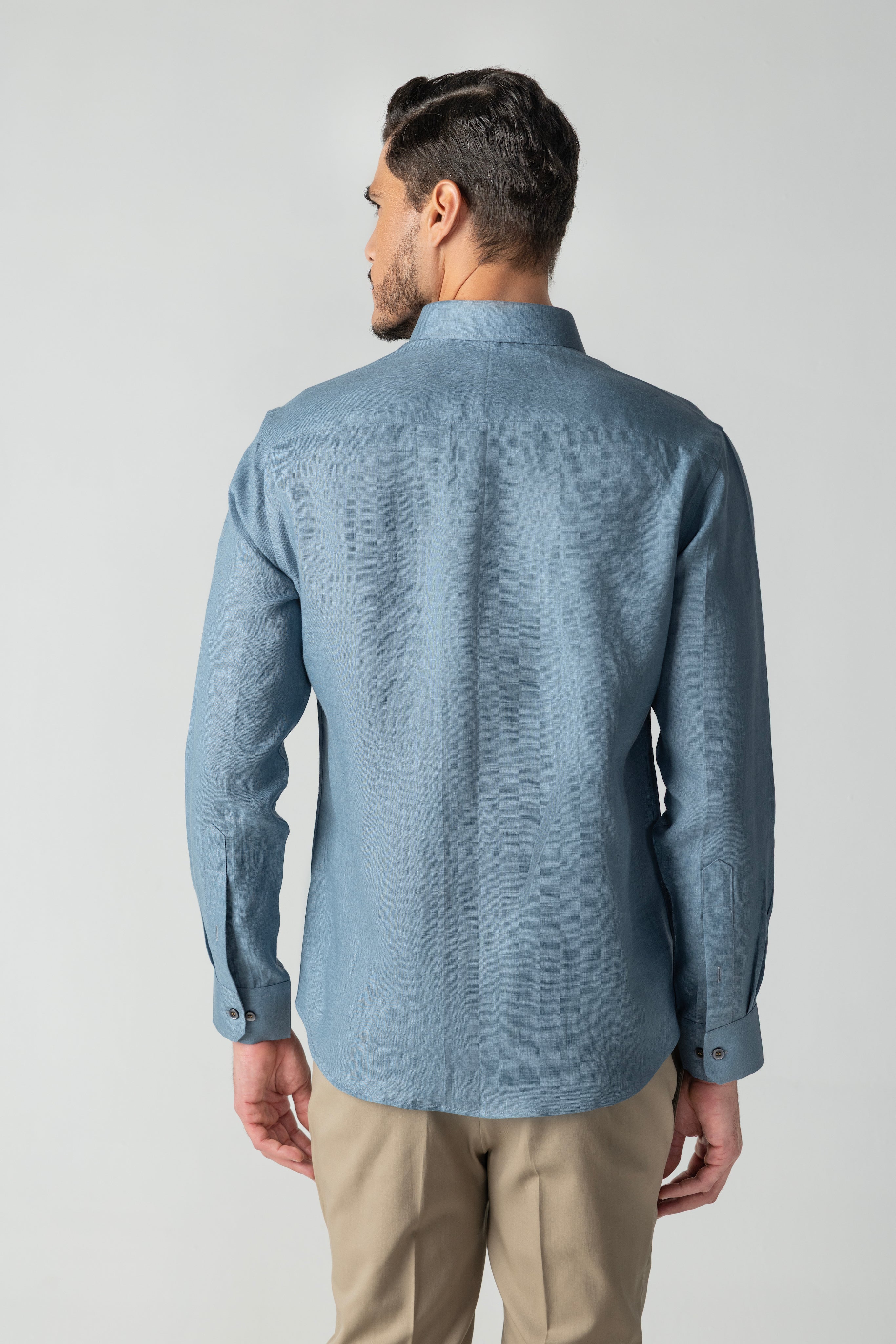 Blue linen shirt with multi-coloured round circular embroidery detailing