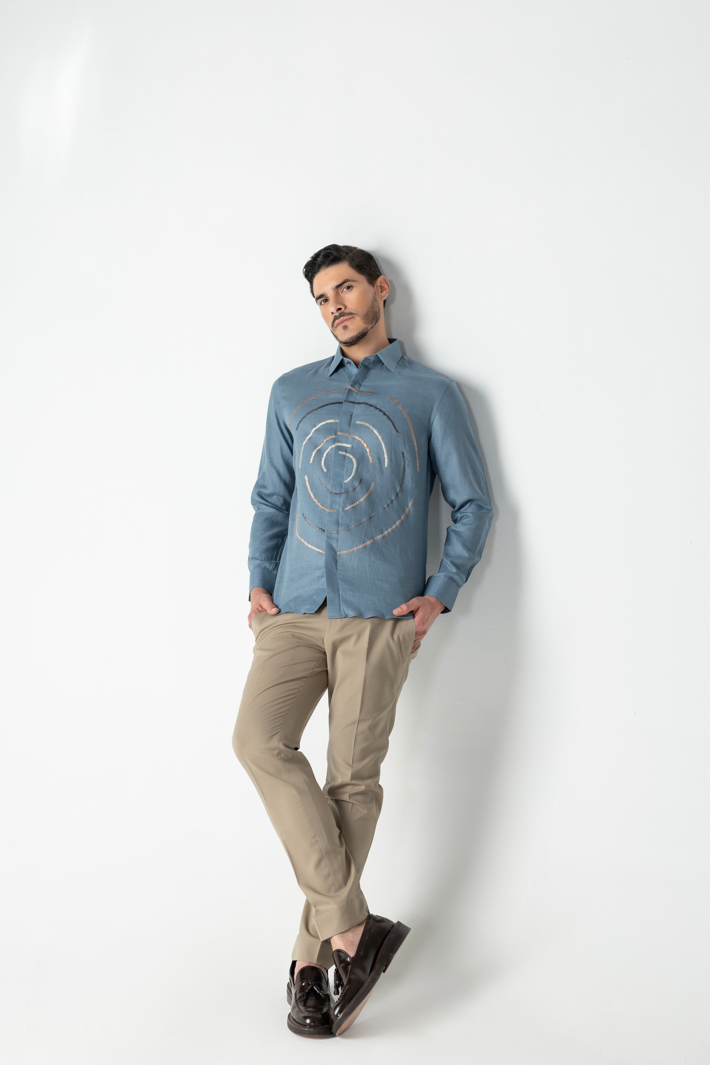 Blue linen shirt with multi-coloured round circular embroidery detailing