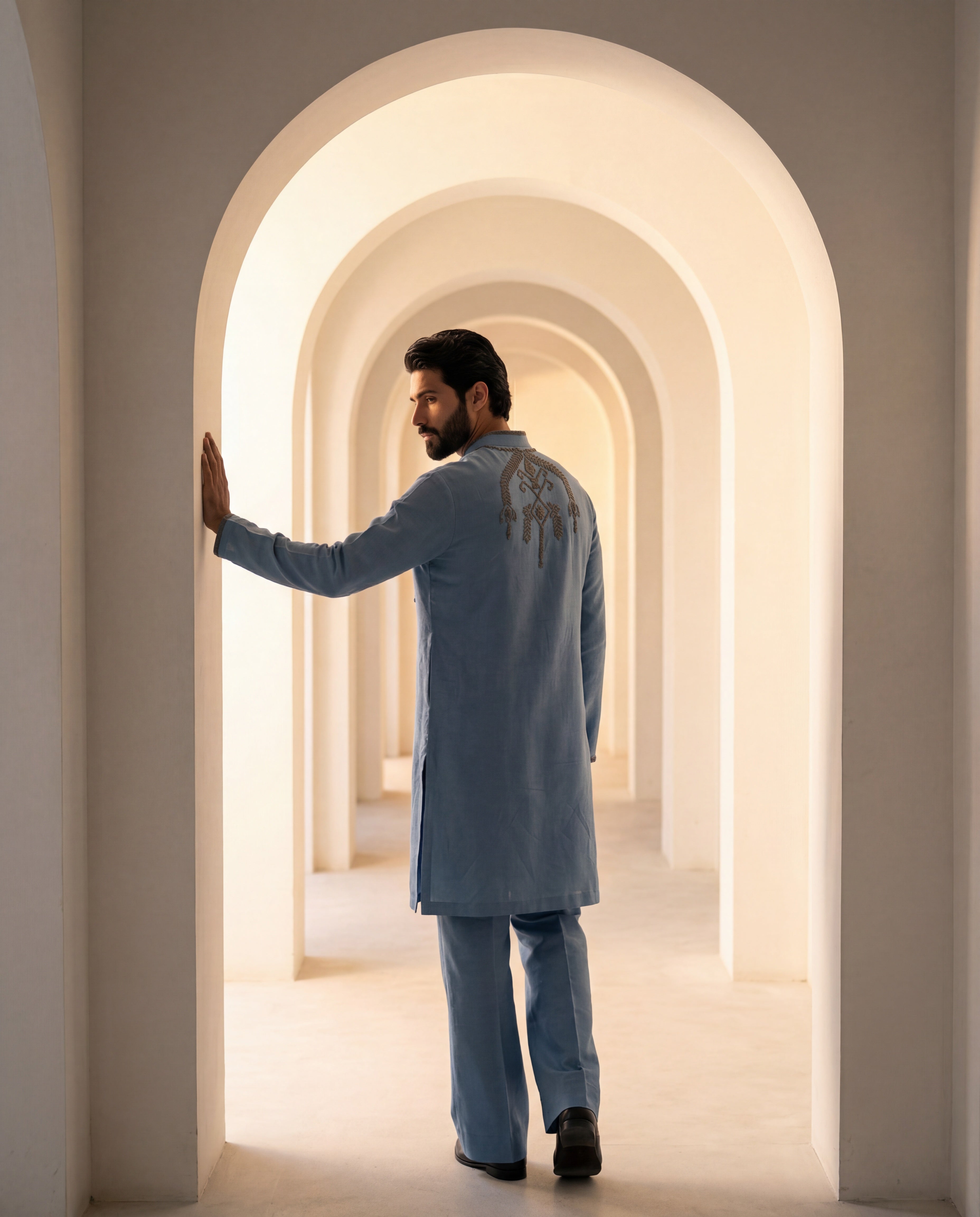 Blue Chanderi silk kurta with intricate embroidered detailing, paired with matching Chanderi silk aligadhi.