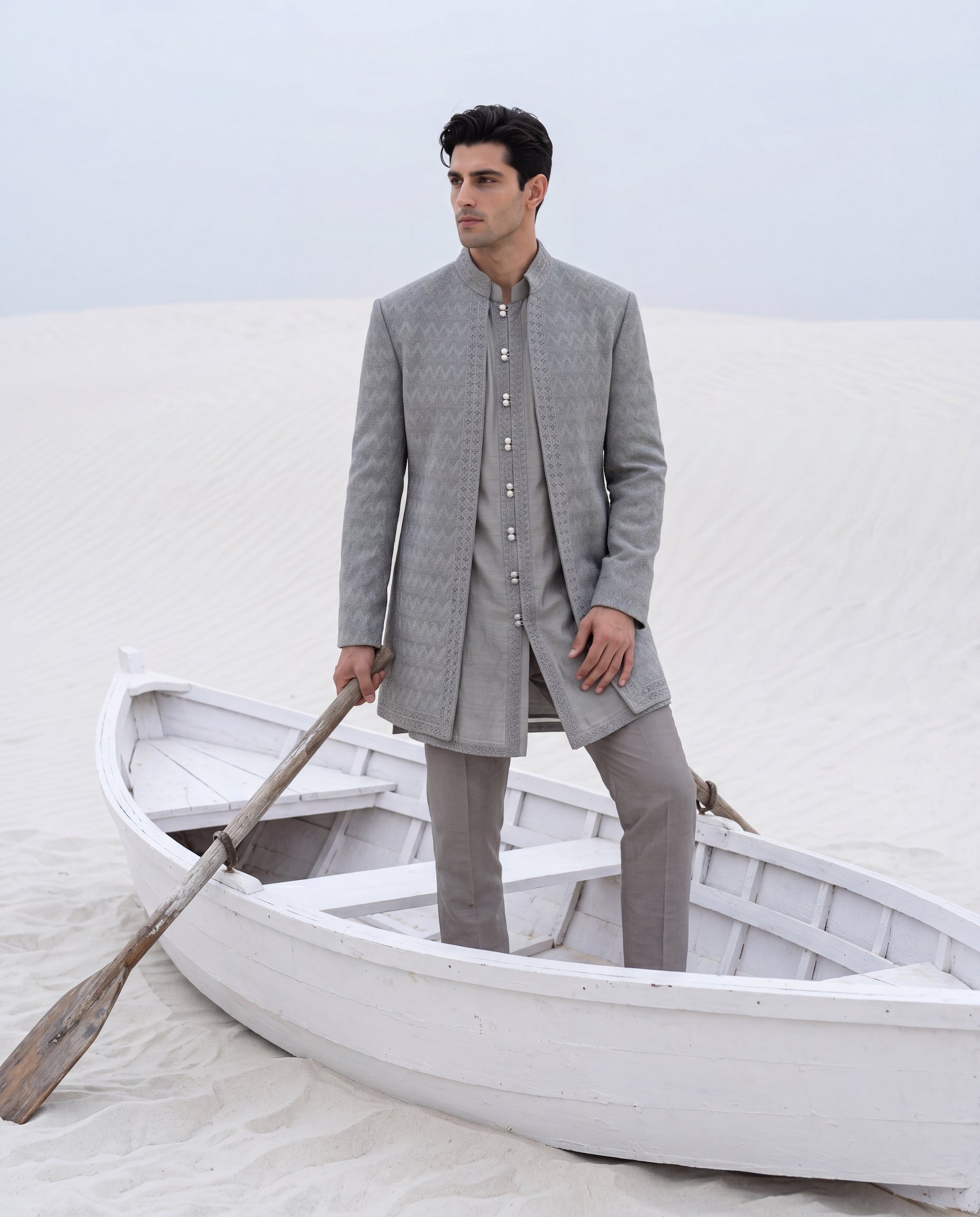 Sage green Crochet Indo-Western jacket with tonal embroidery detailing, paired with a Monga silk kurta and knit pants.