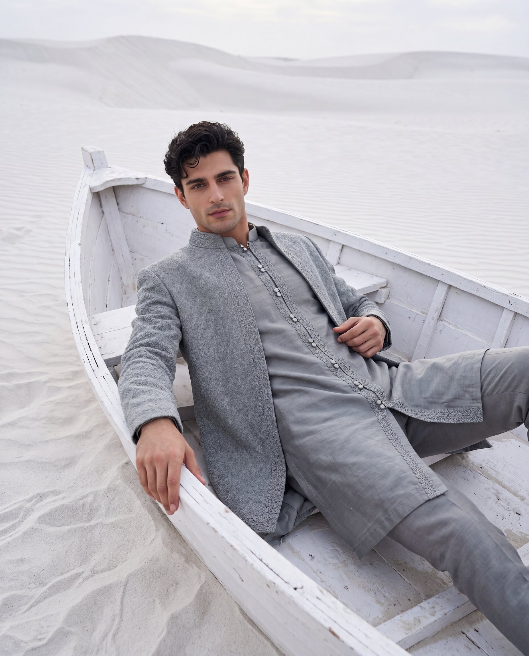 Sage green Crochet Indo-Western jacket with tonal embroidery detailing, paired with a Monga silk kurta and knit pants.