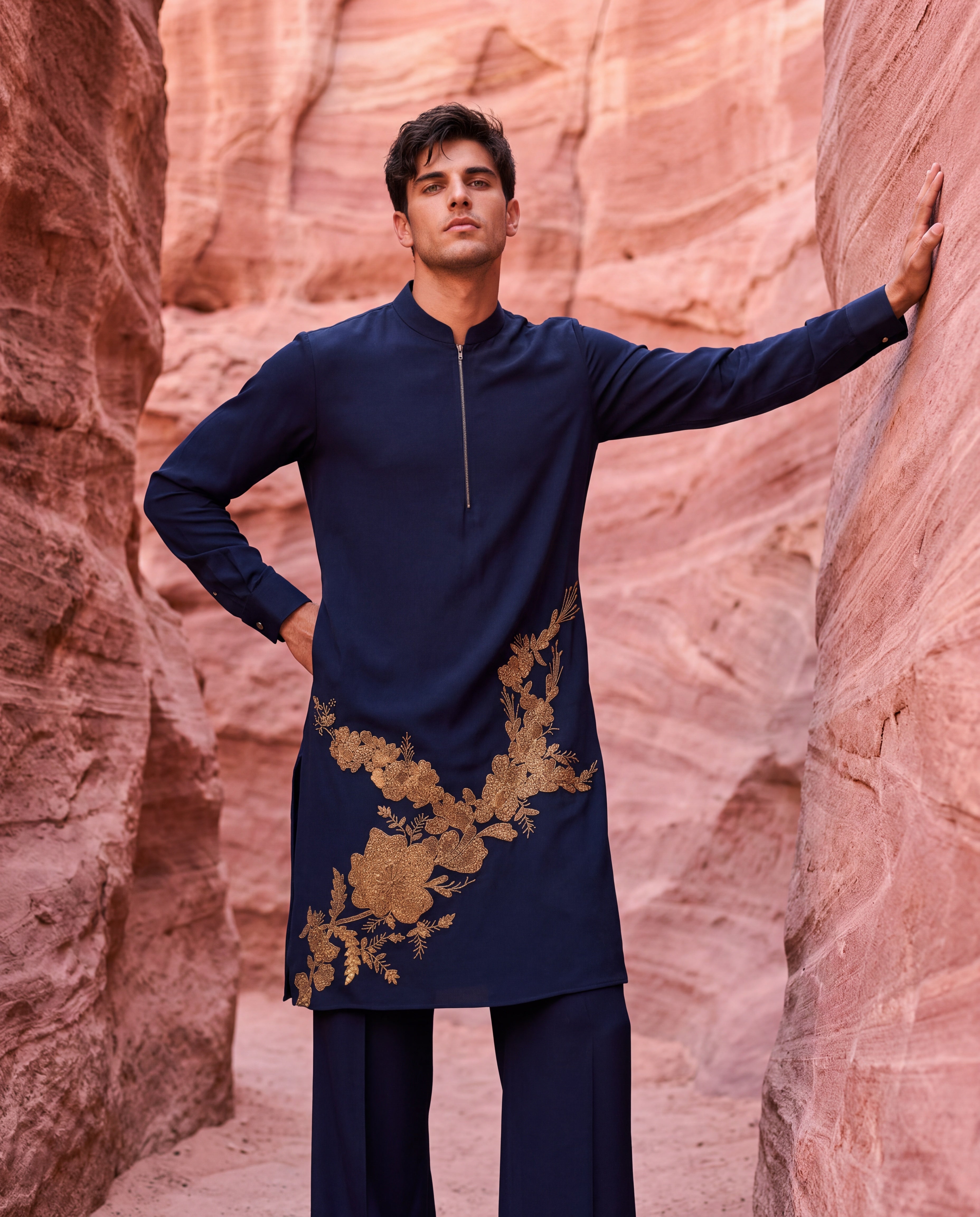 Navy blue knit kurta with gold embroidery detailing, paired with matching knit palazzo.