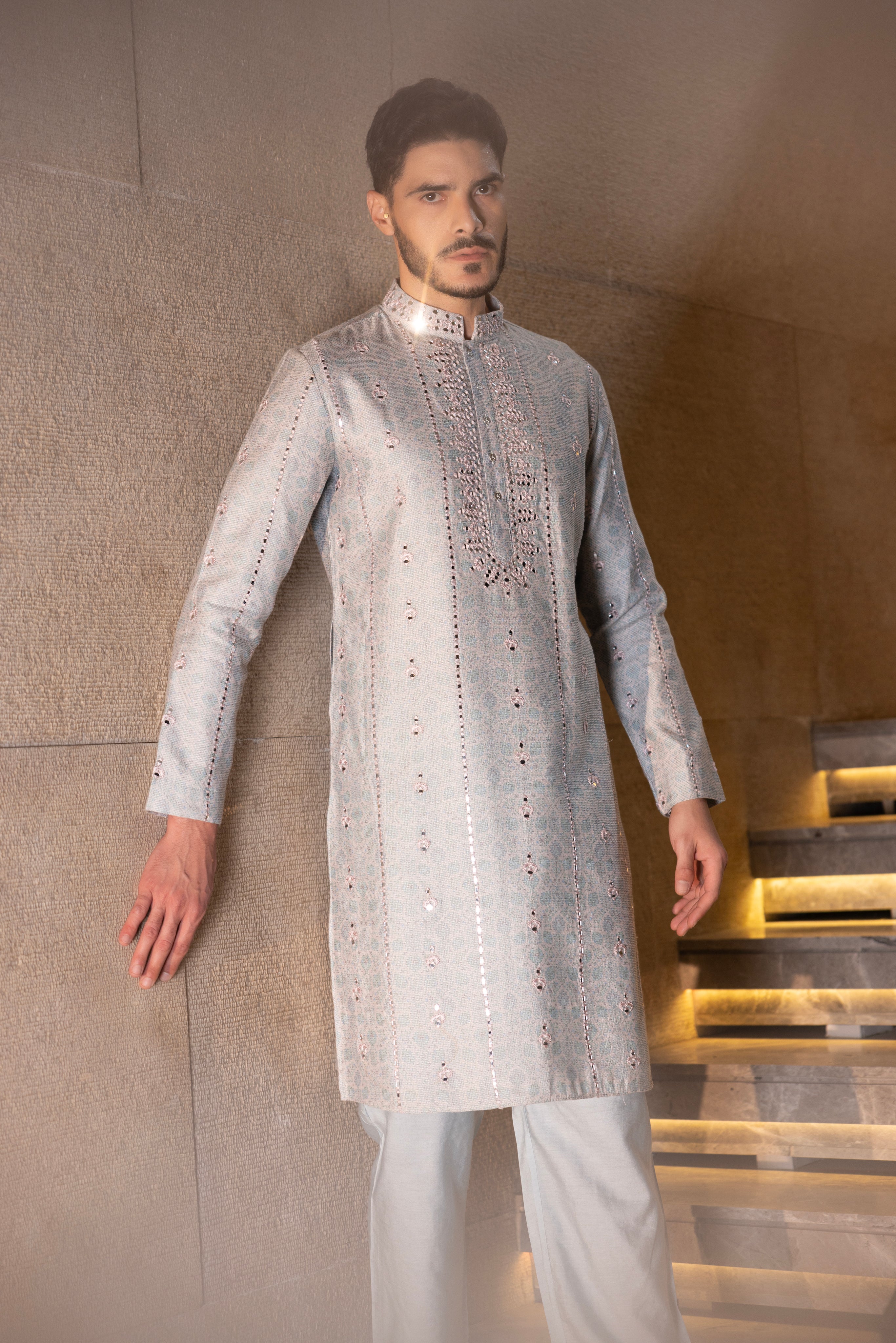 Sky Blue & Pink floral digital print kurta accentuated with mirror work paired with a plain aligadhi.