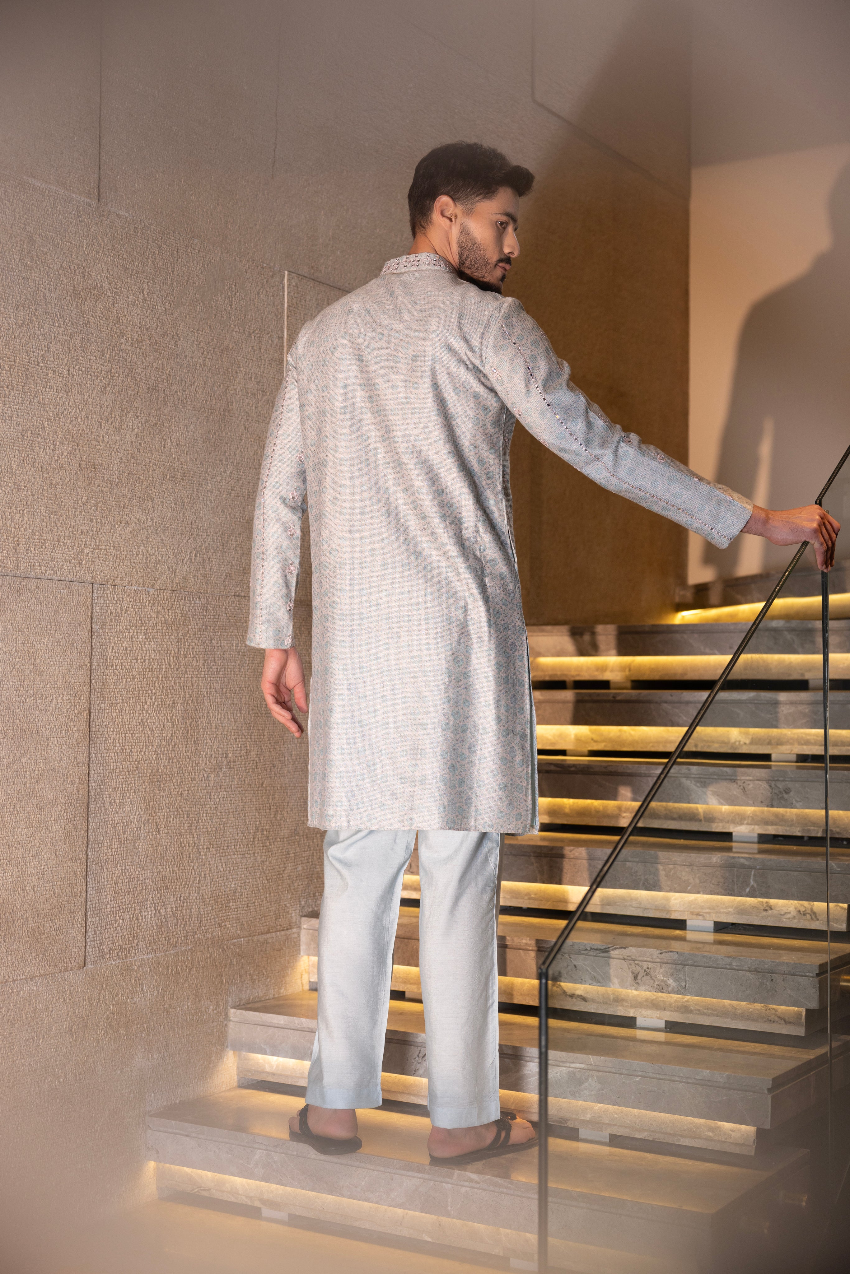 Sky Blue & Pink floral digital print kurta accentuated with mirror work paired with a plain aligadhi.