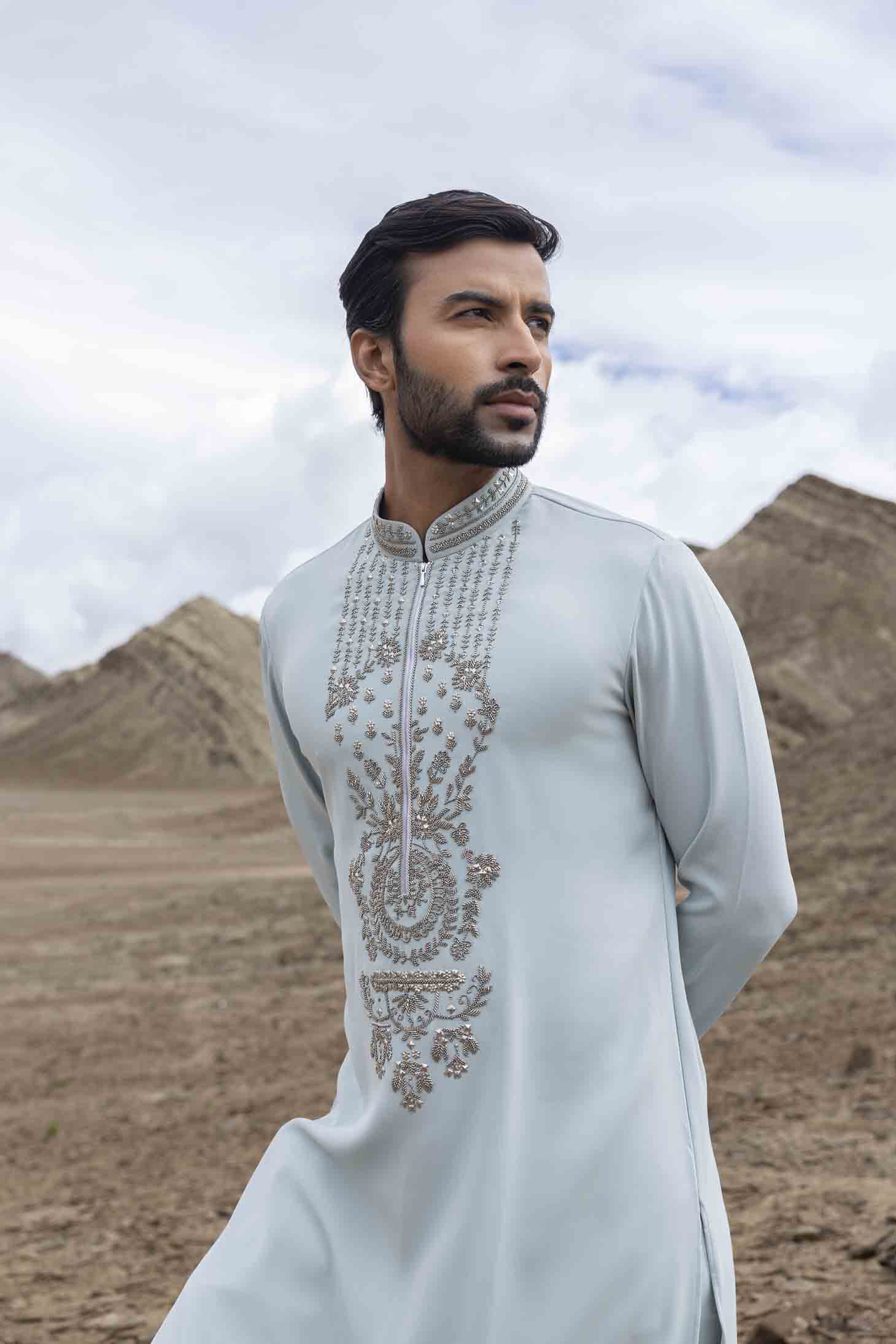 Teal Knit Kurta set with Metal Embellishments on Placket, Cuffs & Collar, Paired with Aligarhi Pants