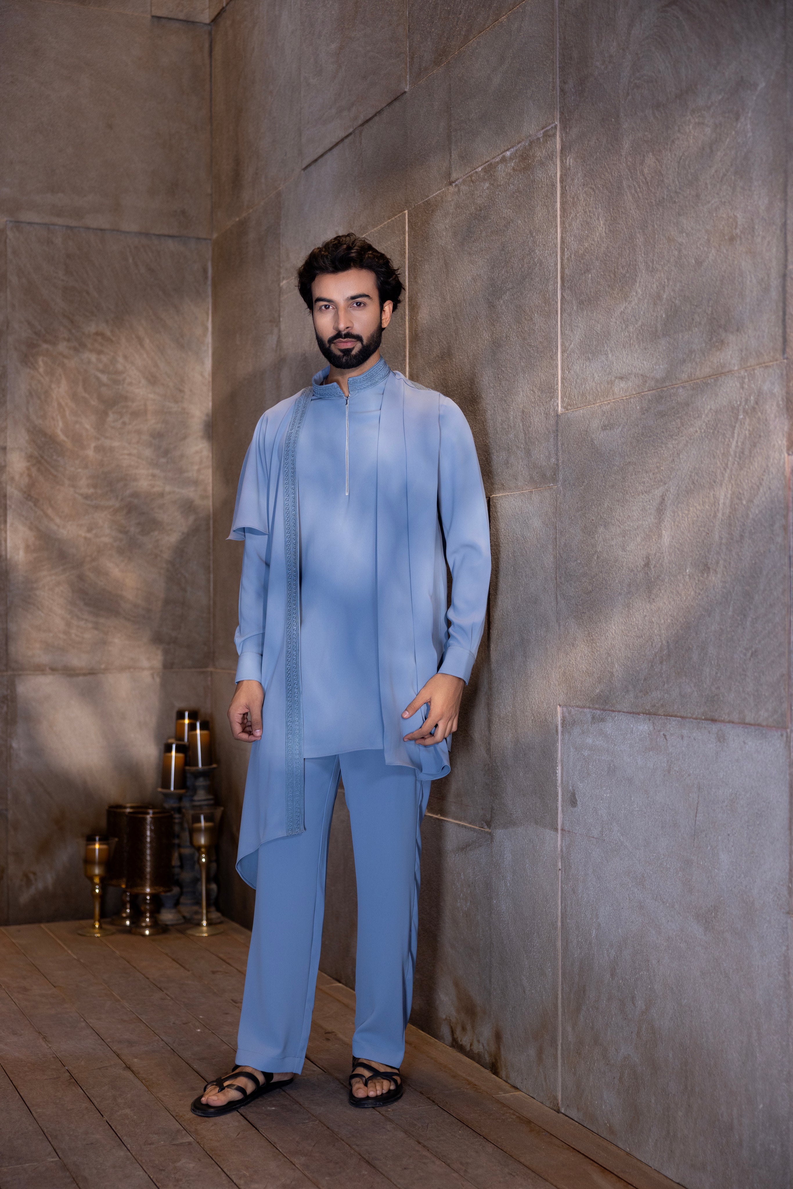 Sky blue hand-embroidered kurta with draping details paired with a matching aligadhi.
