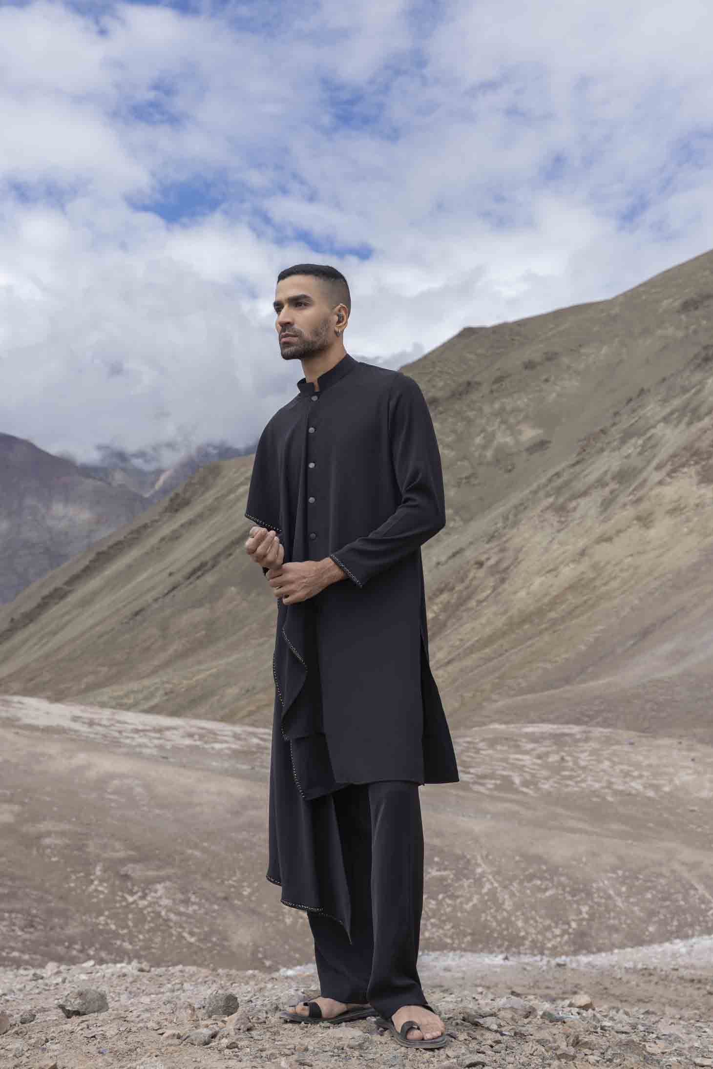 Black Knit Kurta set with Asymmetrical Cut & Antique Metal Rings, Paired with Aligarhi Pants