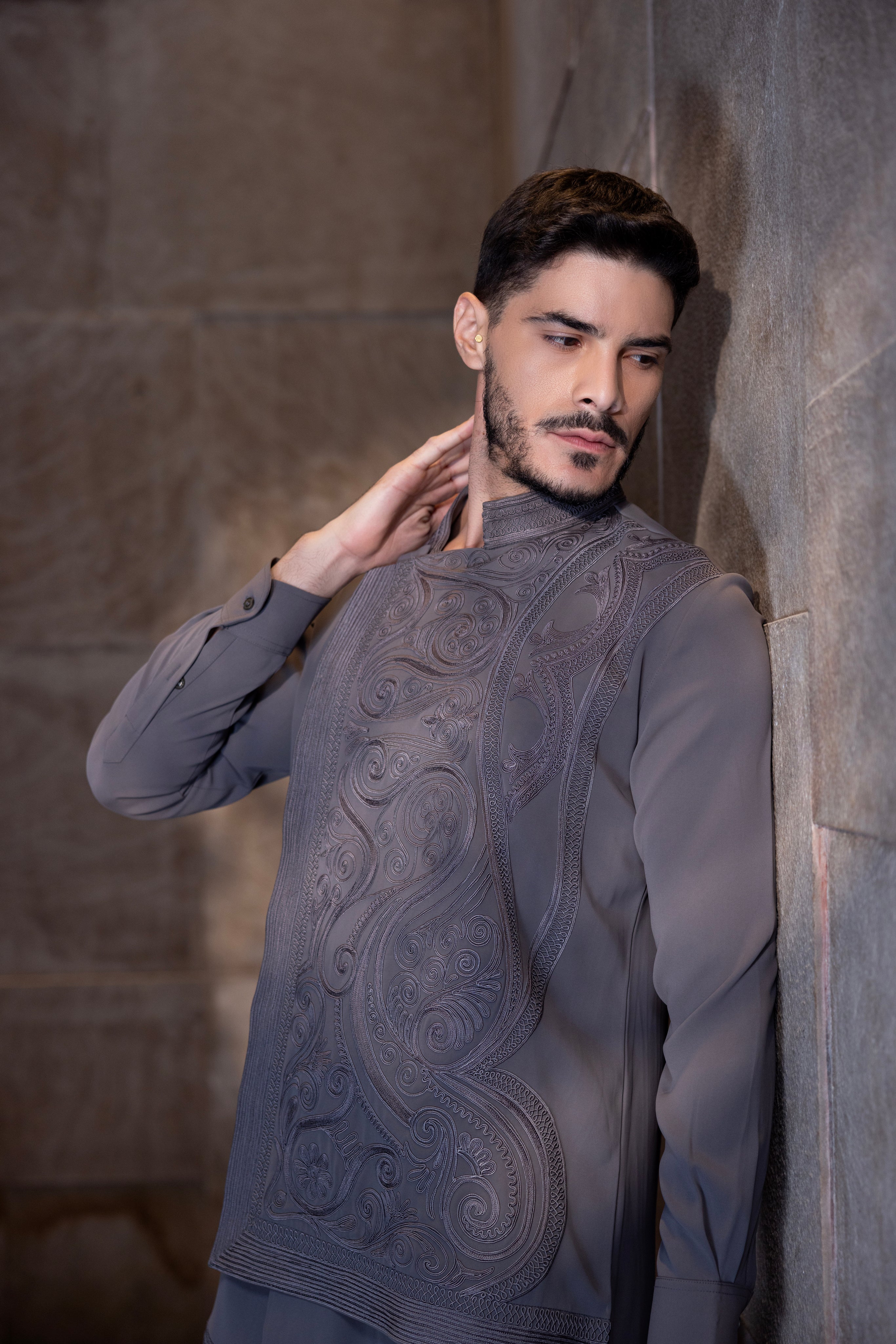 Mouse colour asymmetrical hand-embroidered kurta paired with a matching aligadhi.