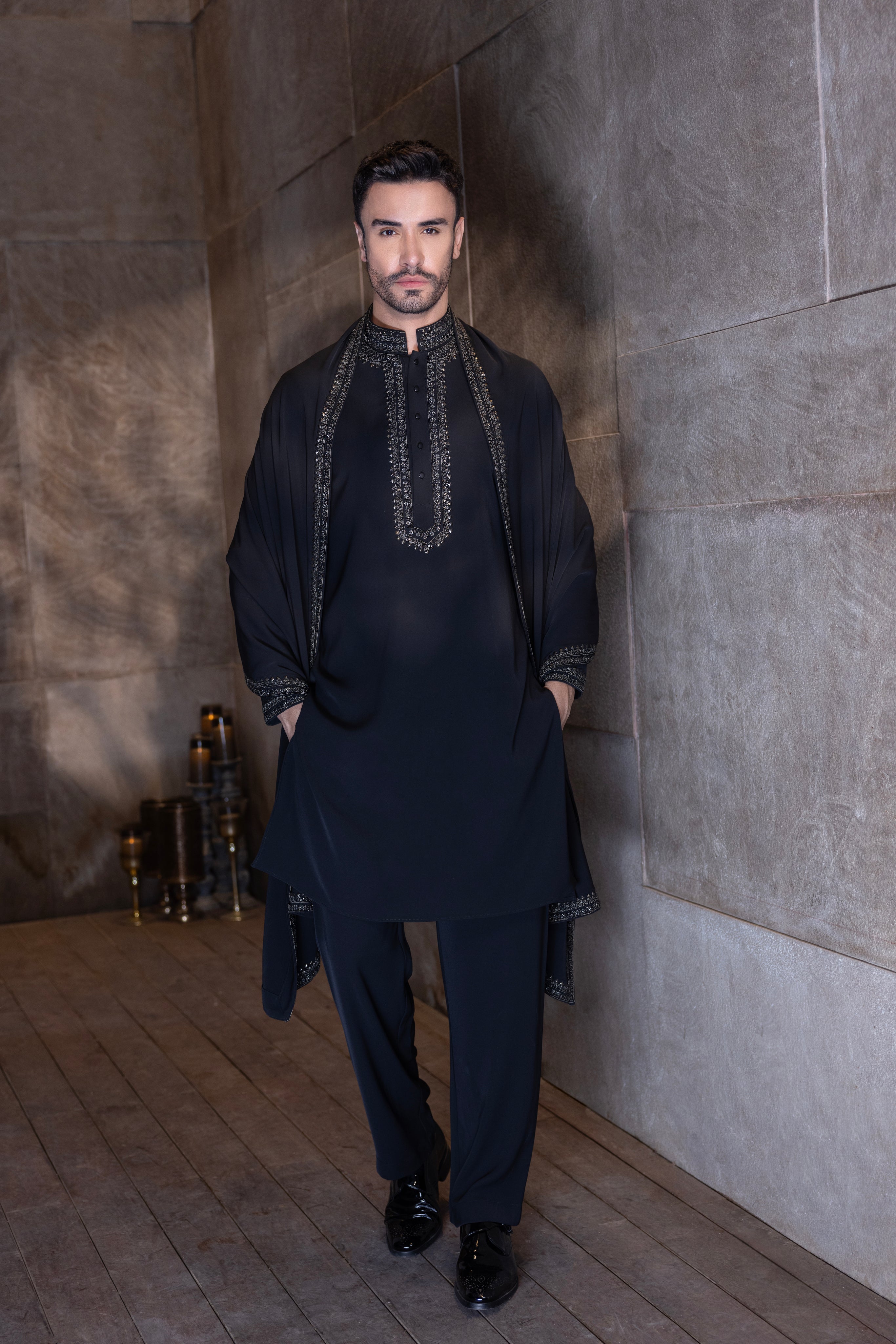 Black hand-embroidered kurta paired with an embroidered stole & aligadhi set.