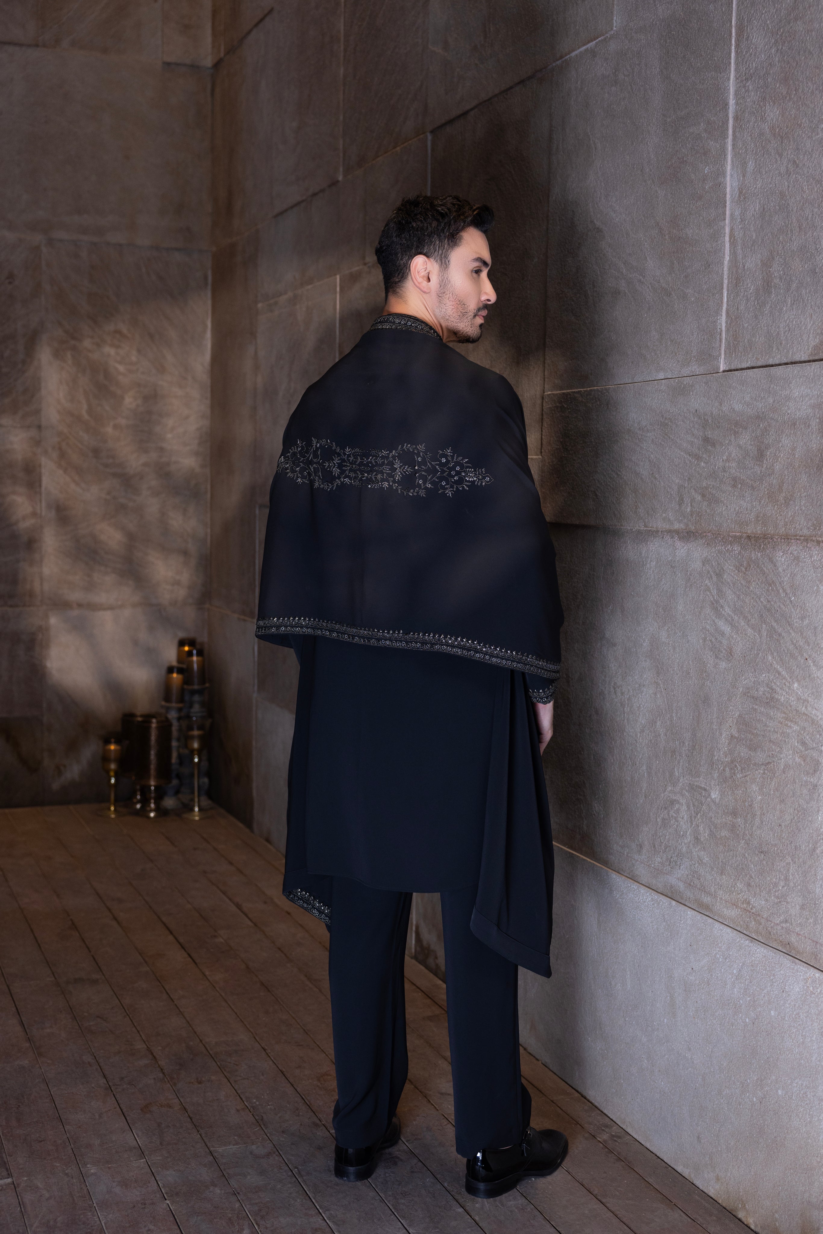 Black hand-embroidered kurta paired with an embroidered stole & aligadhi set.