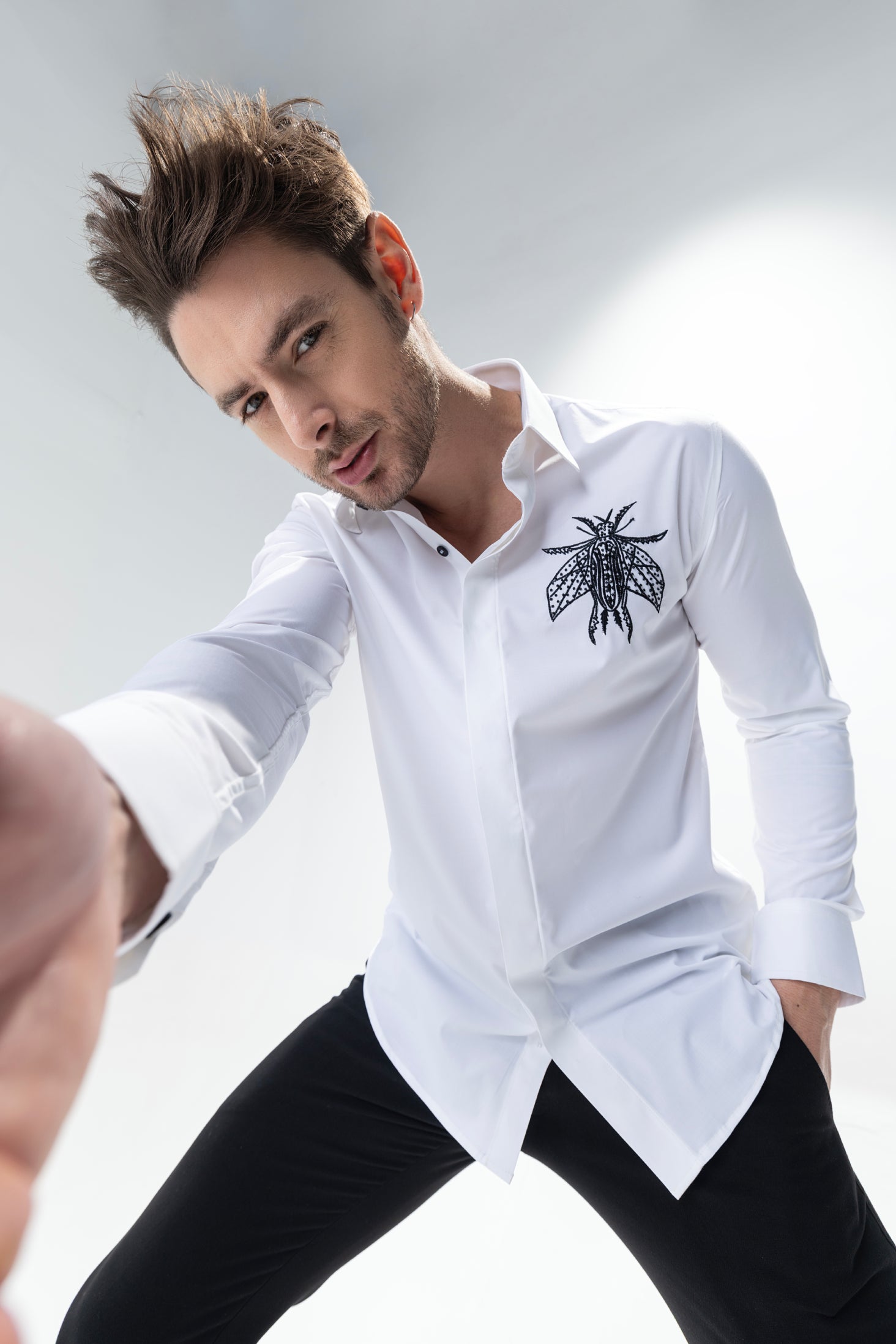 White long sleeved shirt with hand embroidered bug motif