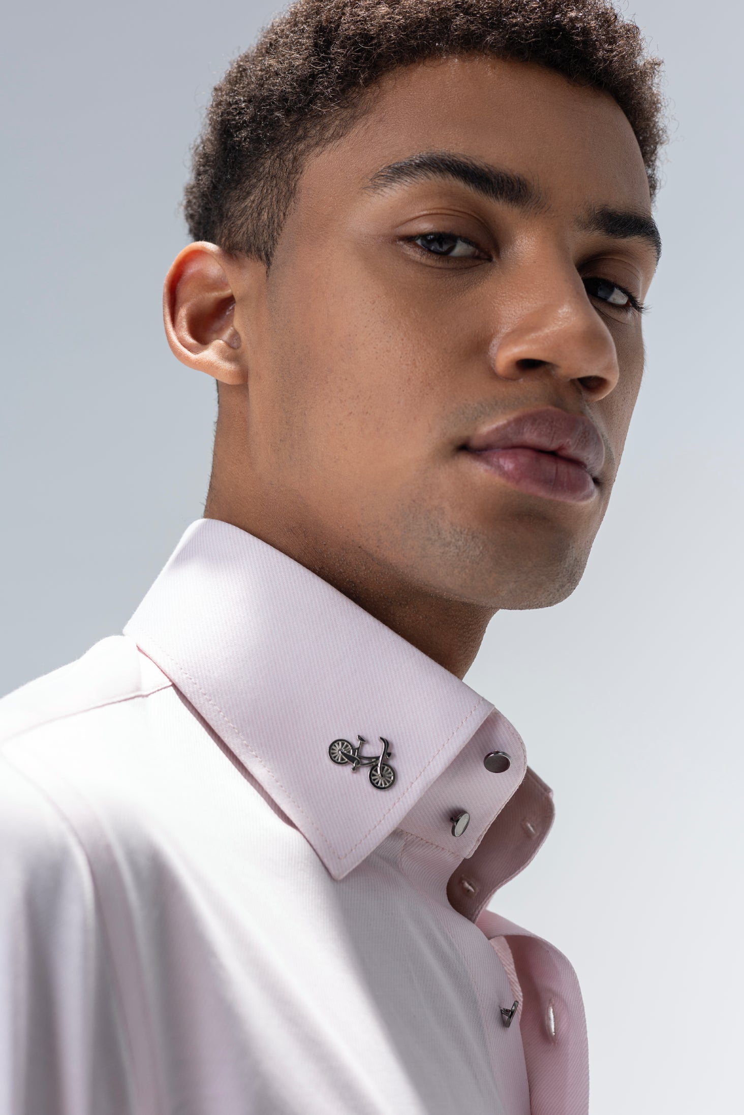 Baby pink full sleeved shirt with bicycle brooch on collar