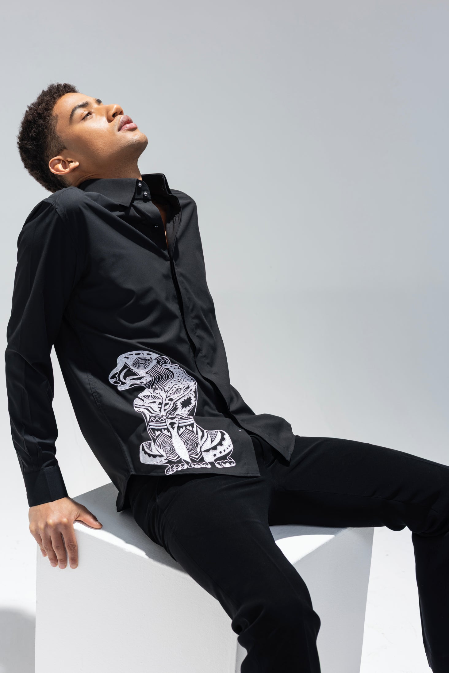 Black full sleeved shirt with embroidered Leopard motif in white