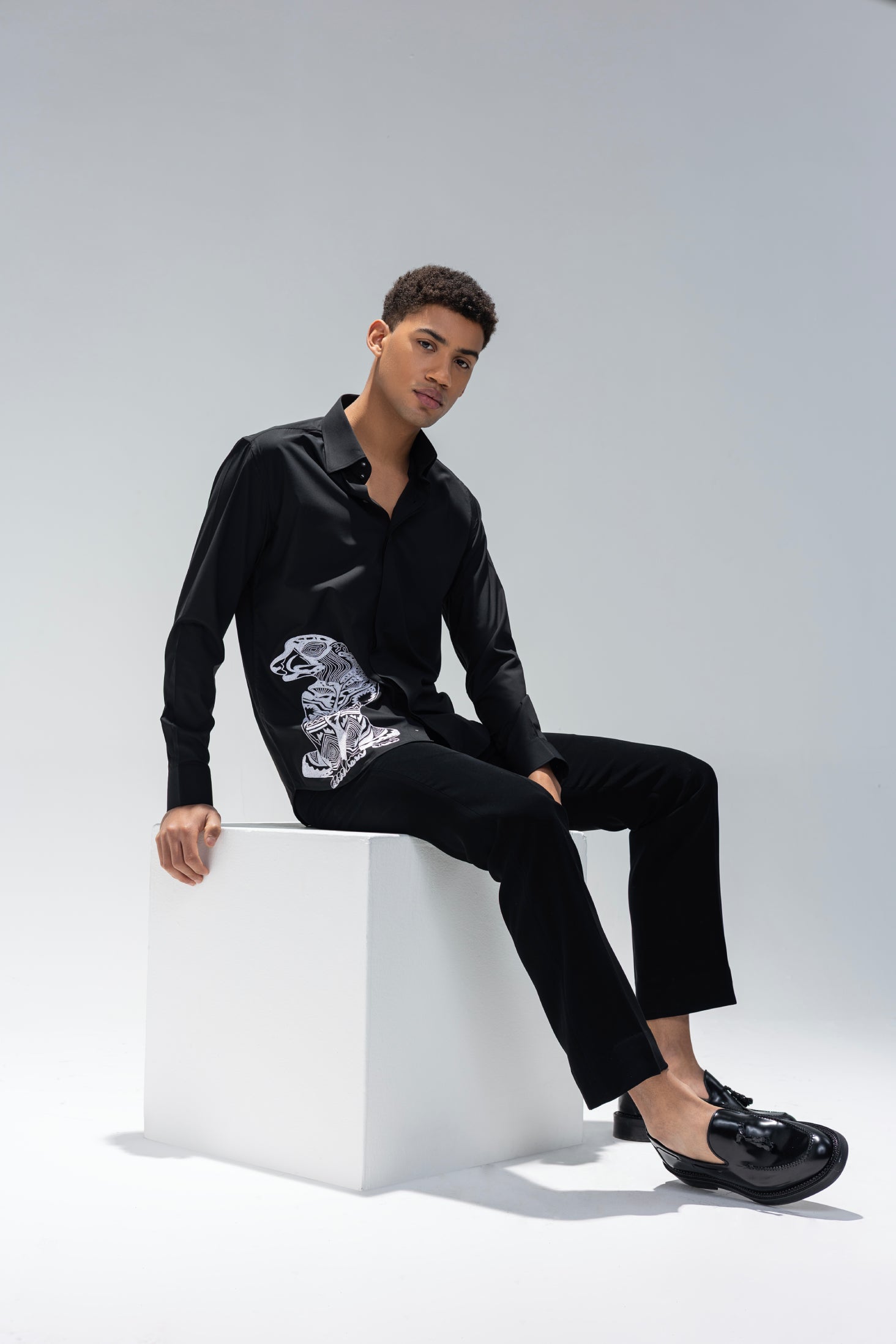 Black full sleeved shirt with embroidered Leopard motif in white