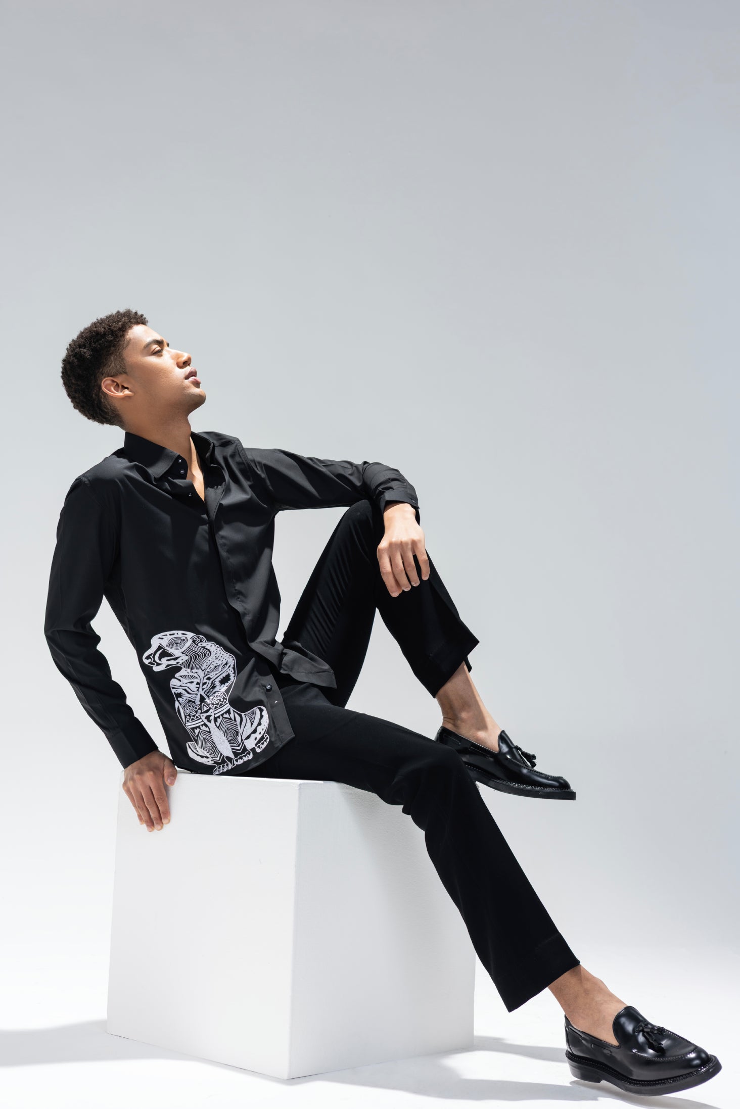 Black full sleeved shirt with embroidered Leopard motif in white