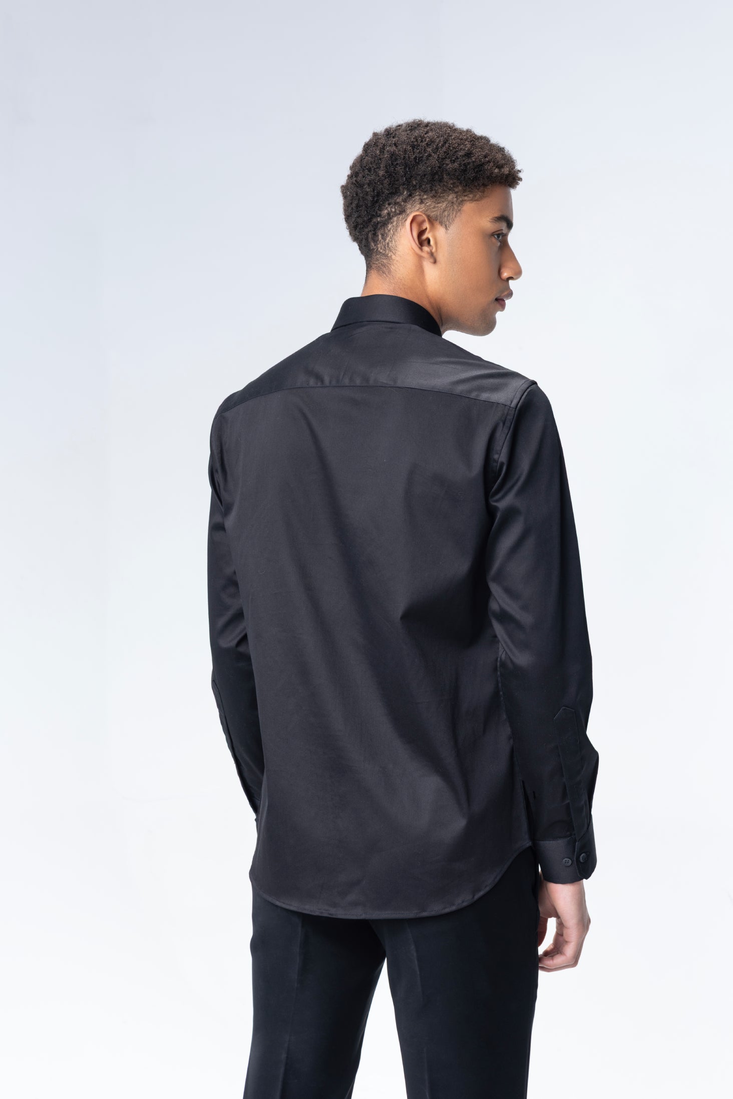 Black shirt with hand-embroidered circular