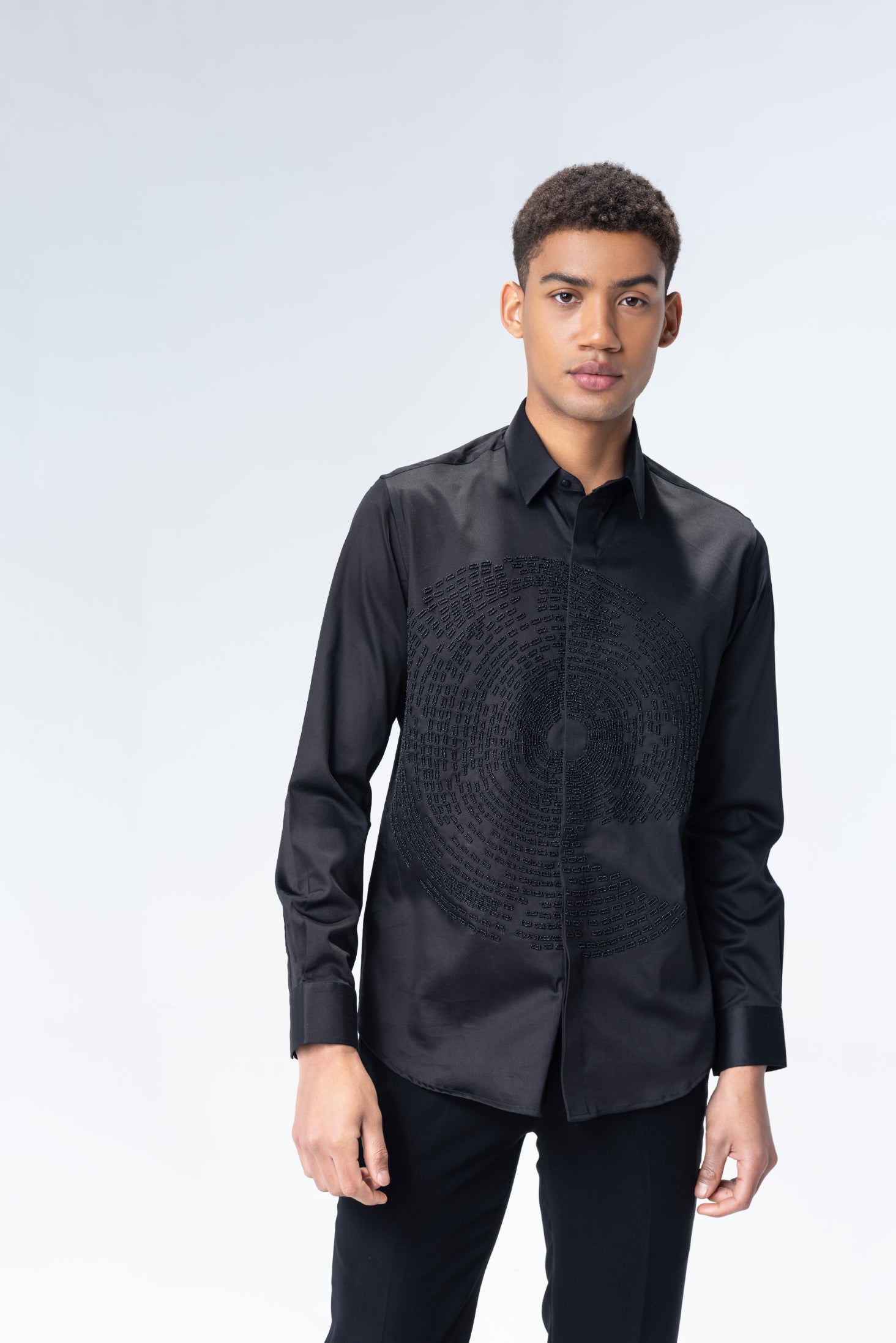 Black shirt with hand-embroidered circular