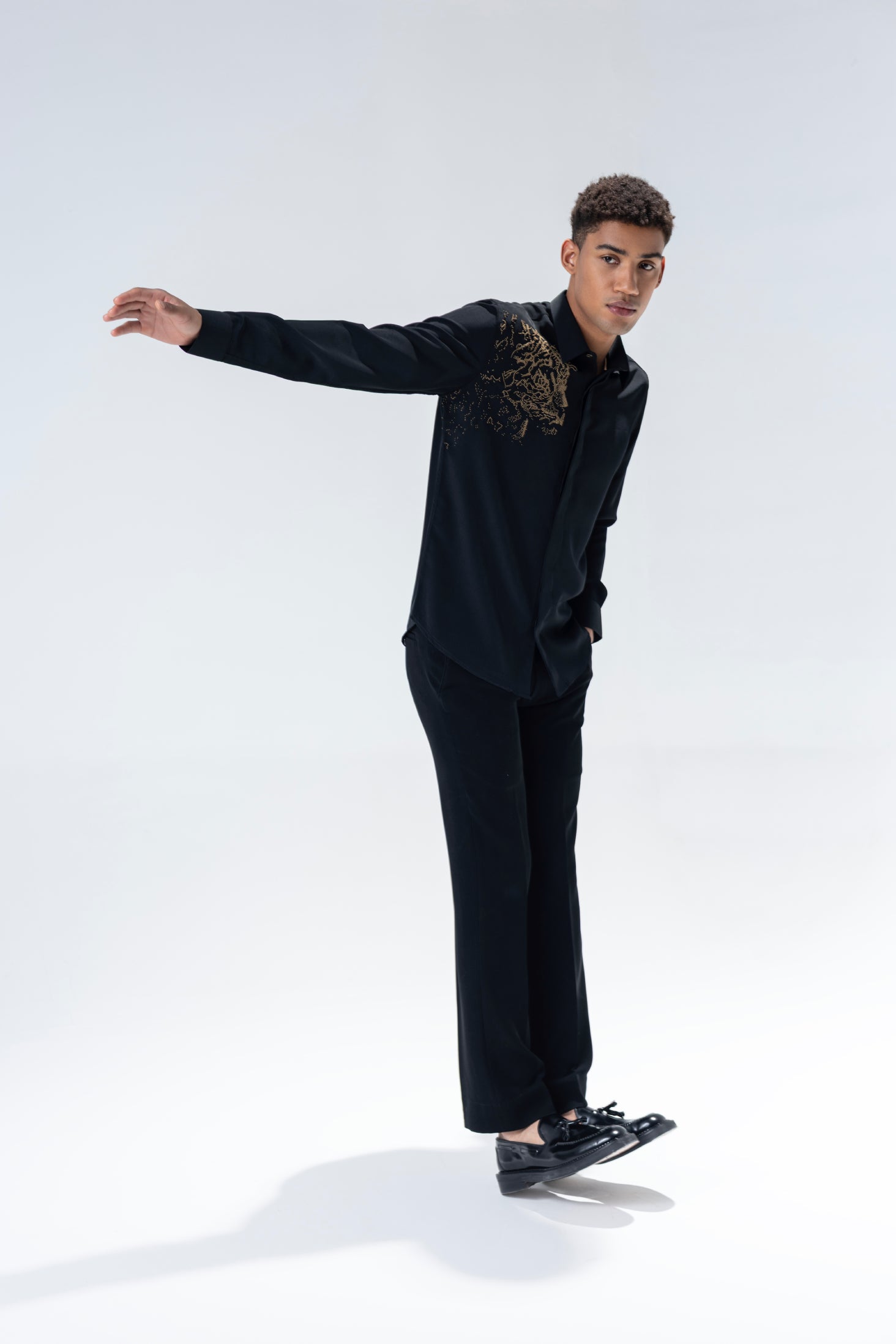 Black full sleeved shirt with hand embroidered Lion motif in gold